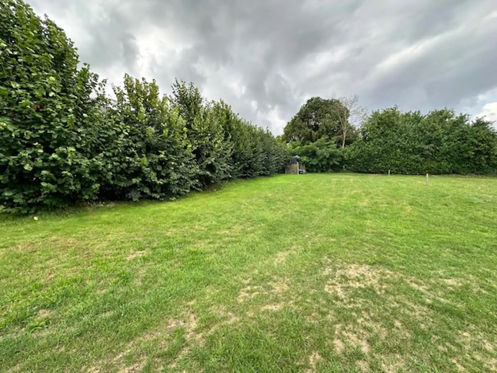 TE KOOP - bouwgrond van 3a86ca voor een halfopen bebouwing foto 2