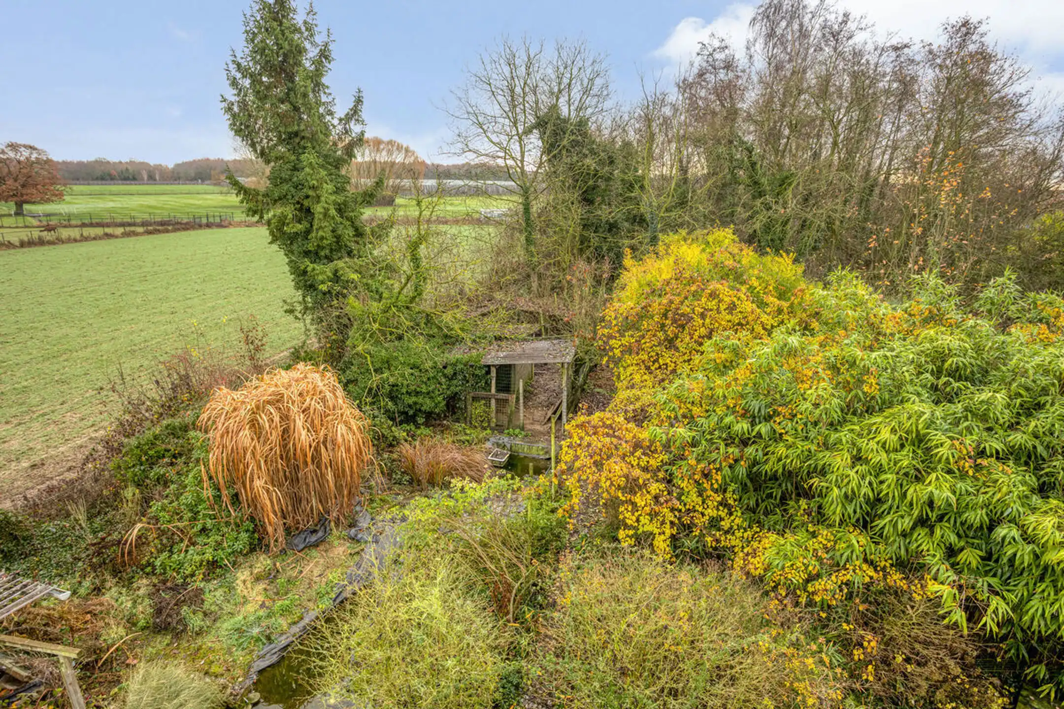 Uniek rustig gelegen woning met 3 slaapkamers en garage foto 11