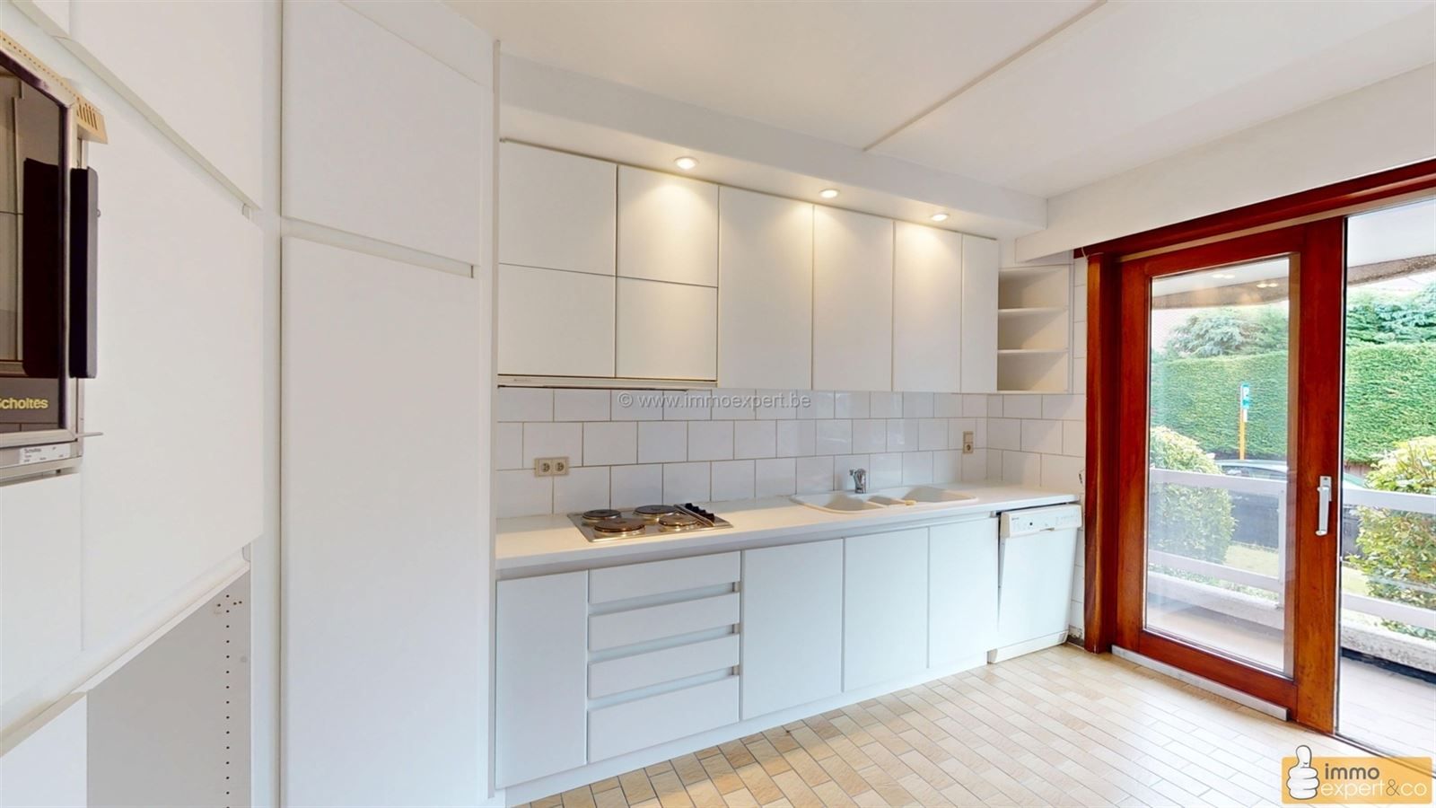 STOMBEEK-BEVER: Ruim appartement + tuin + garage. foto 9