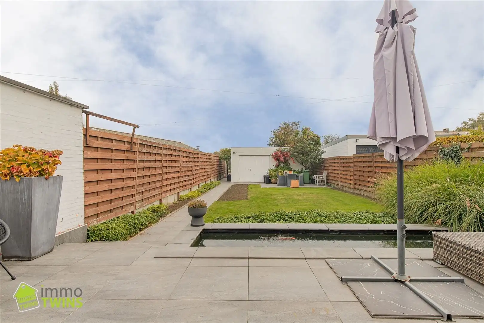 Op zoek naar een duplexwoonst met prachtige tuin/terrassen en garage te Lebbeke foto 12