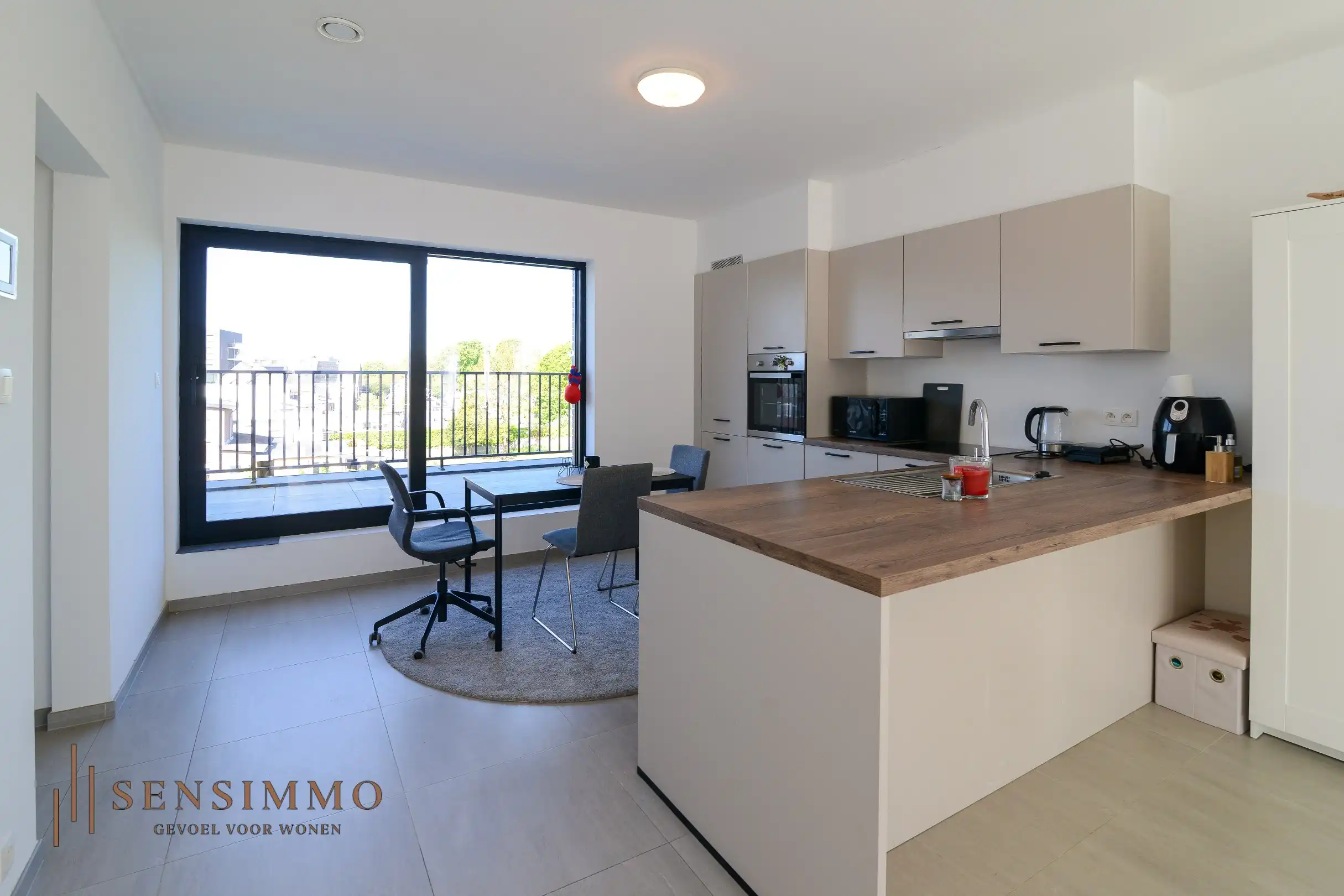 Instapklaar & energiezuinig 1-slaapkamerappartement met 2 terrassen en parking in Maasmechelen foto 5