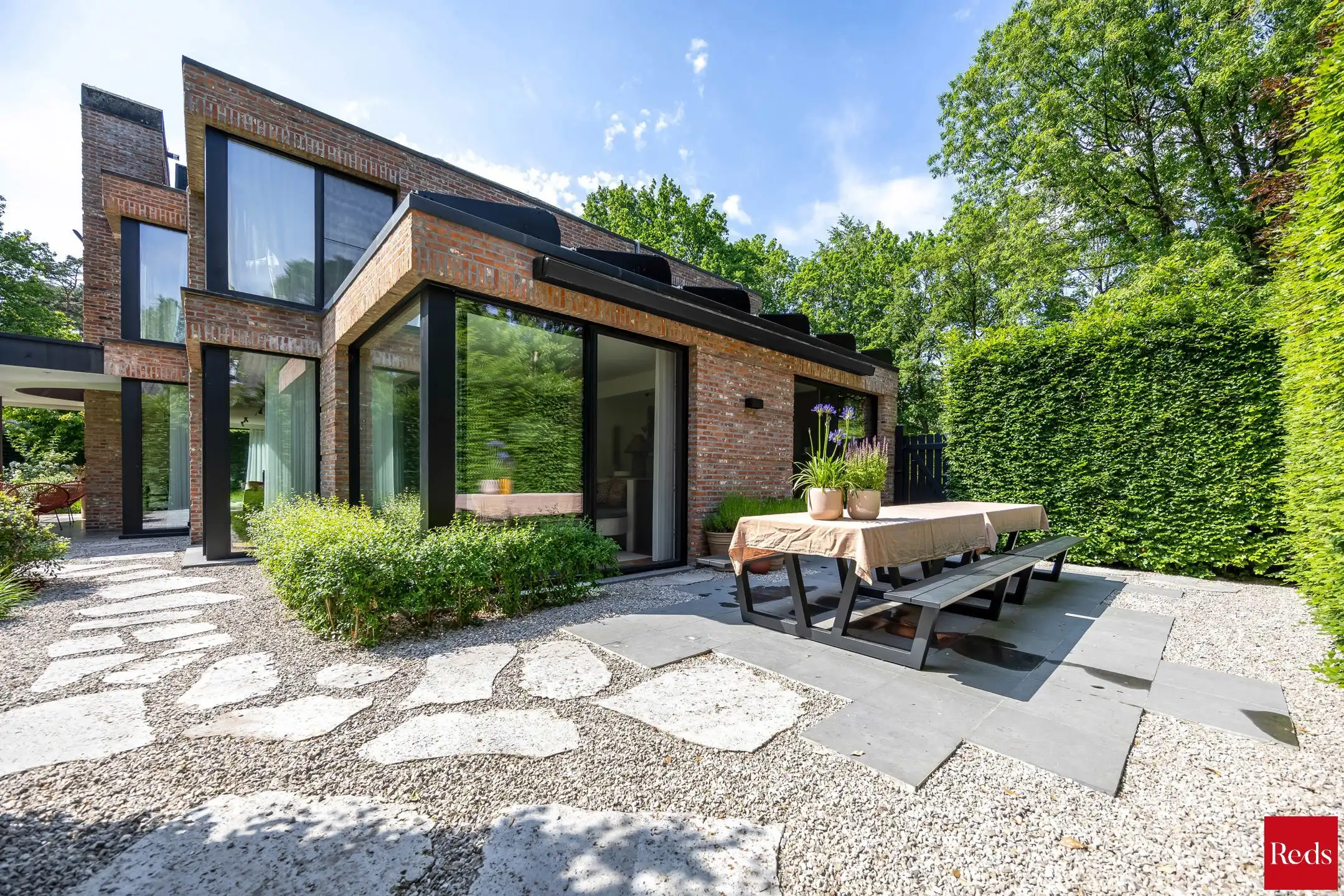 Architectenvilla met zwembad en ZW tuin in Hof Ter Linden foto 17
