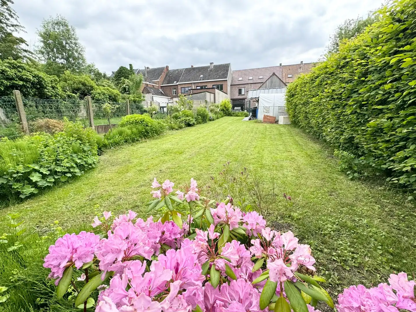 Hoofdfoto van de publicatie: Ruime woning met 4 slaapkamers en grote tuin in centrum Oordegem
