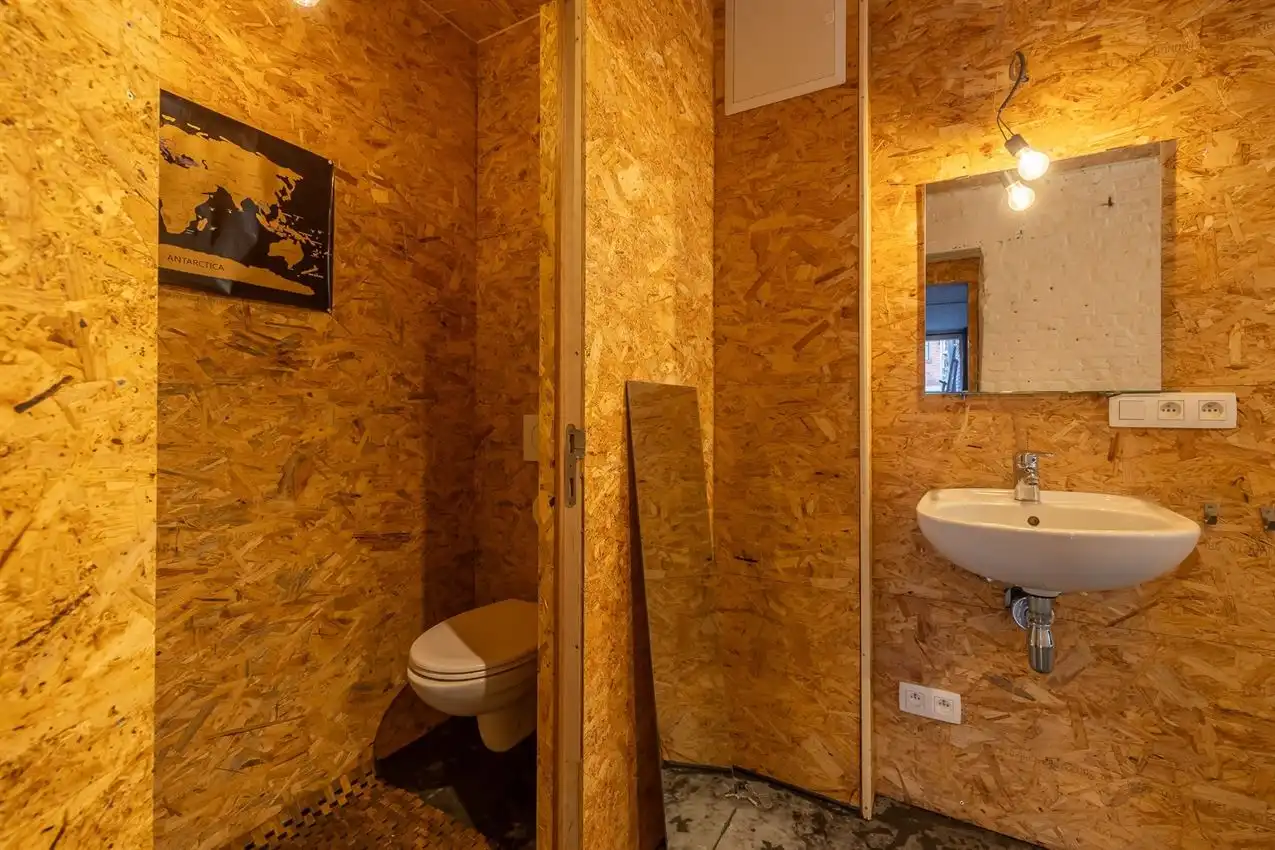 Ruim gelijkvloers appartement met zonnige tuin op toplocatie foto 29