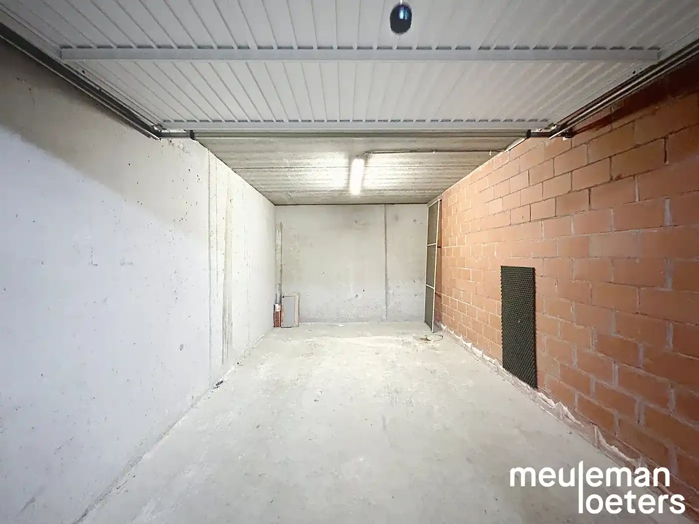 Lichtrijk driegevel appartement met ondergrondse garagebox foto 18