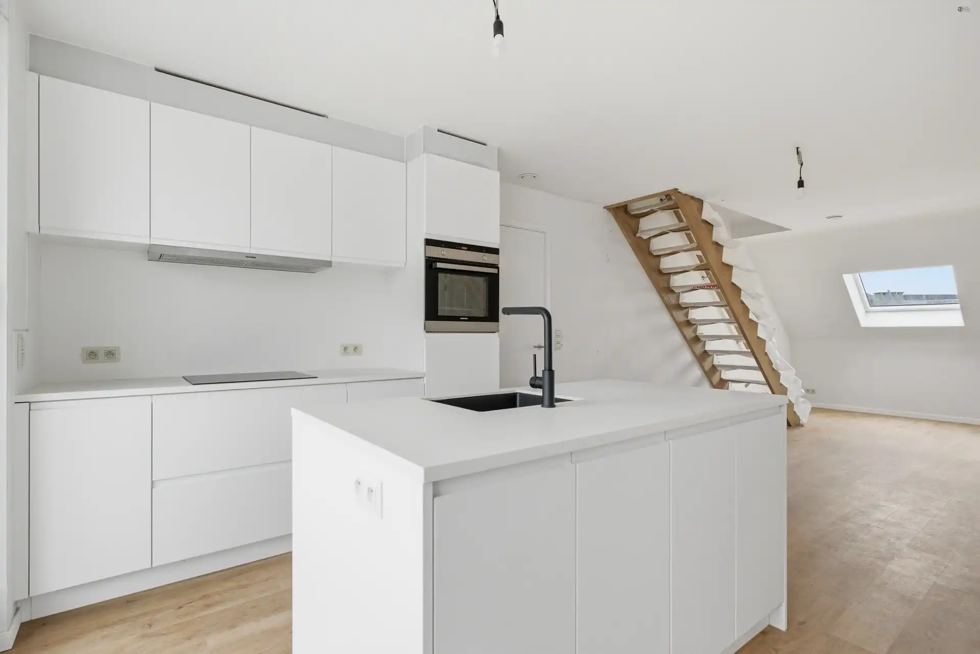 Ruim duplex appartement met 3 slaapkamers en 2 badkamers foto 9