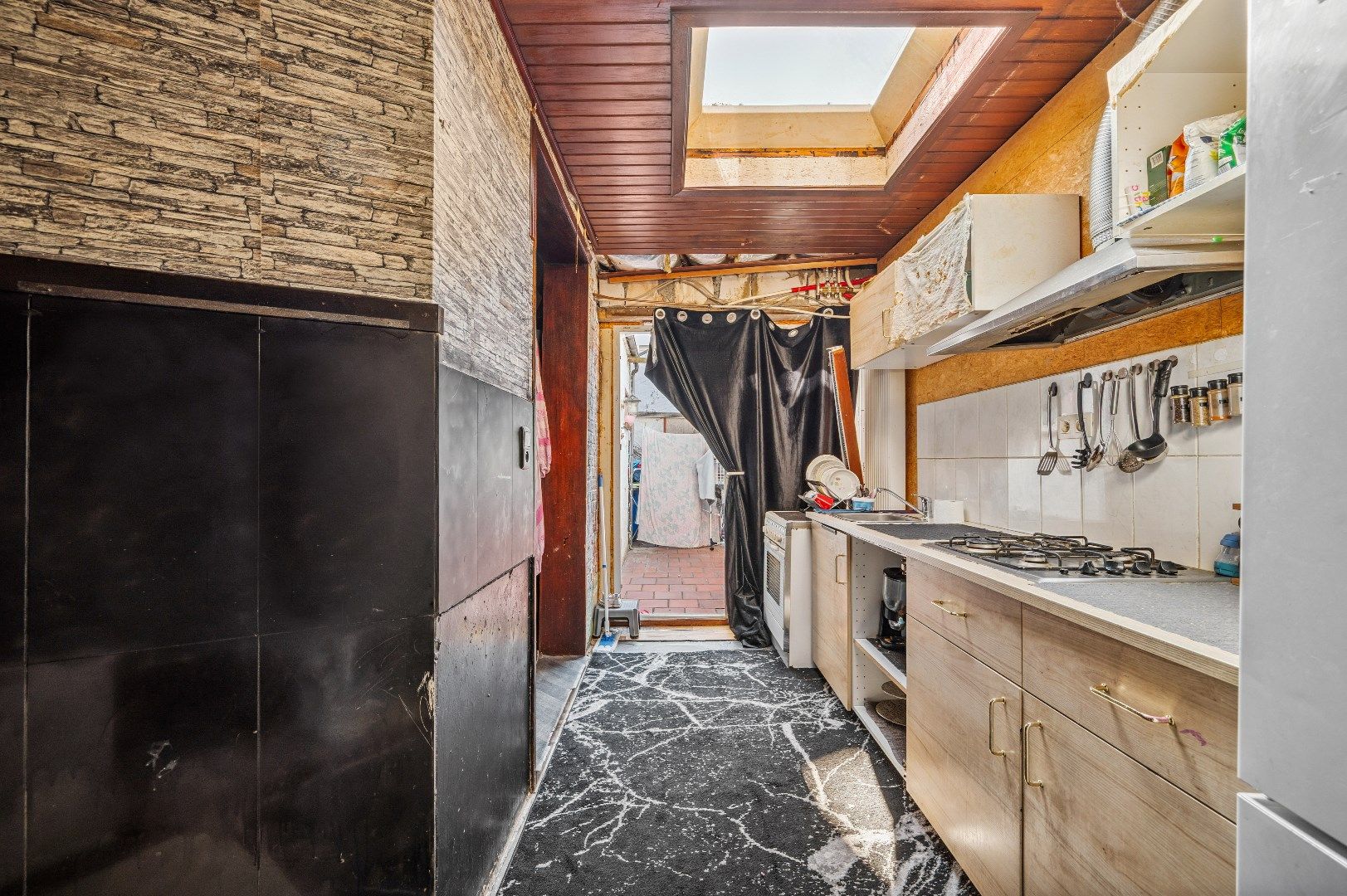 Te renoveren rijwoning met potentieel in de buitenrand van Tienen foto 10