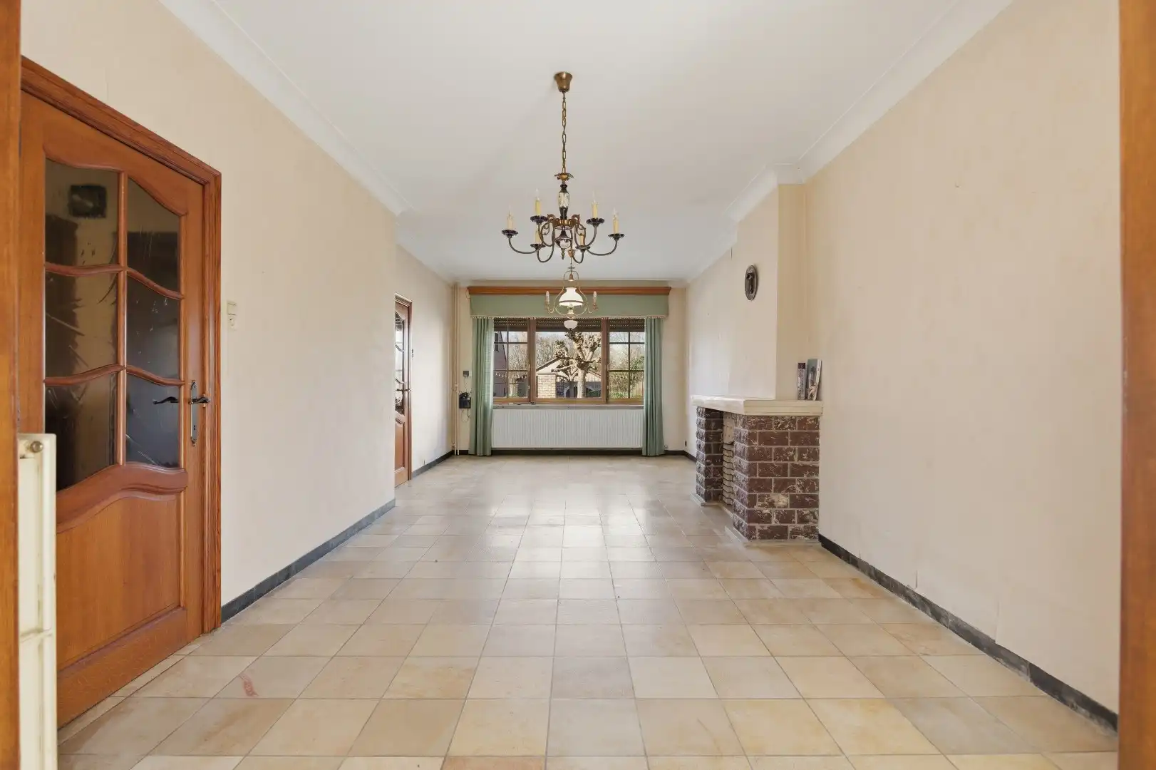 Op te frissen rijwoning met 2 slaapkamers en ruime tuin in Tienen foto 7