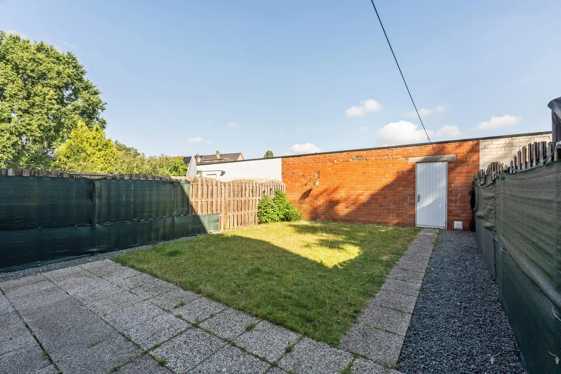 Op te frissen gelijkvloersappartement met 3 slpk's, tuin en garage foto 14