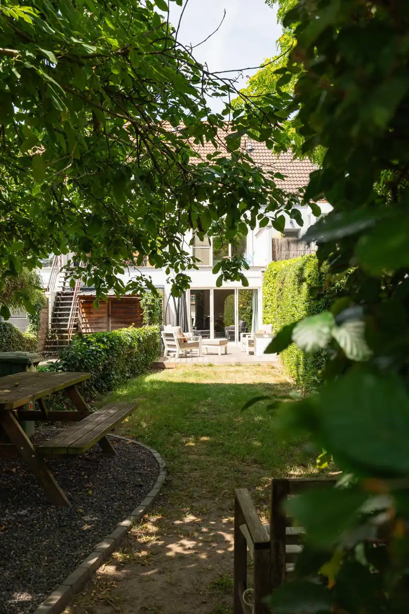 Uniek triplex-appartement met mooie tuin op toplocatie foto 21