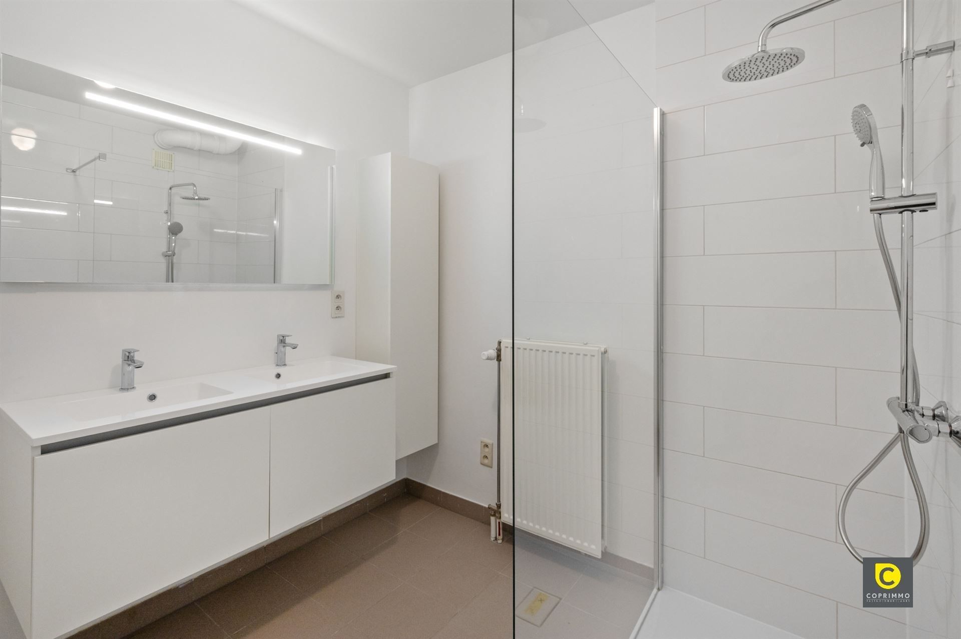 Gelijkvloers app met 2 slpk, tuin en garagebox foto 17