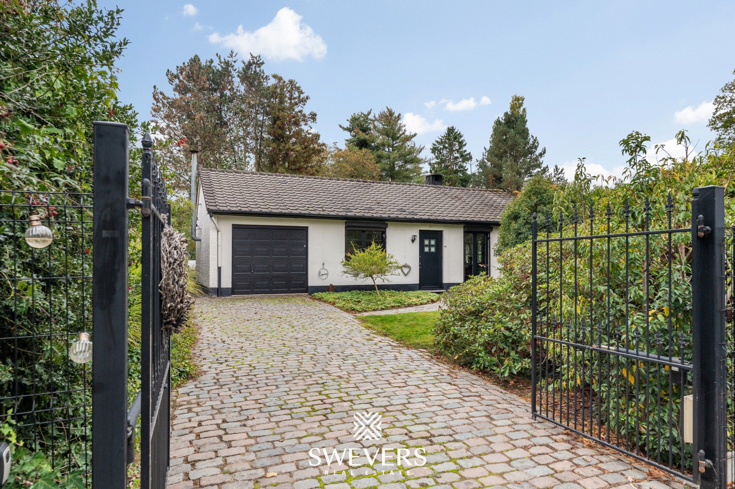 Gerenoveerde gelijkvloerse bungalow op prachtig perceel in het groen (11a 17ca) foto 30