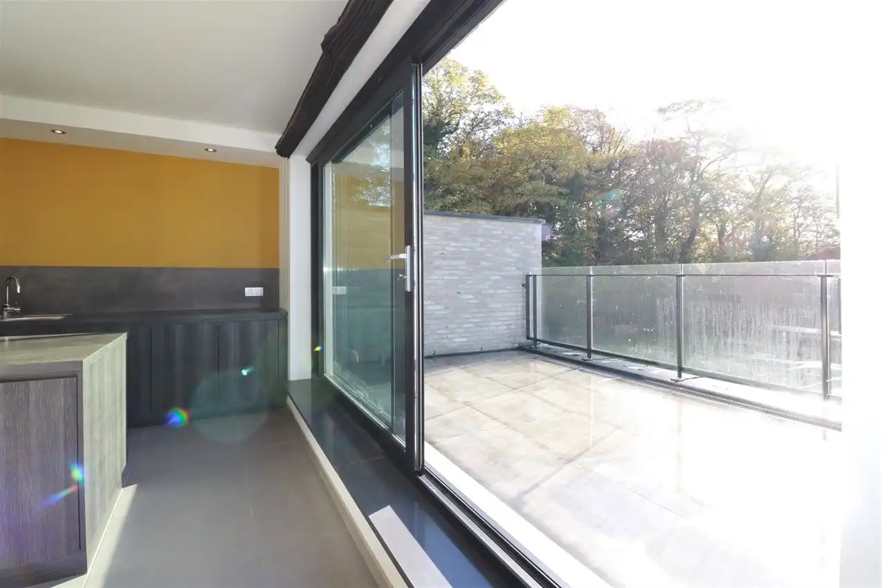 duplex met 2 grote slpk., zuidgericht terras, 2 parkings nabij centrum  foto 3