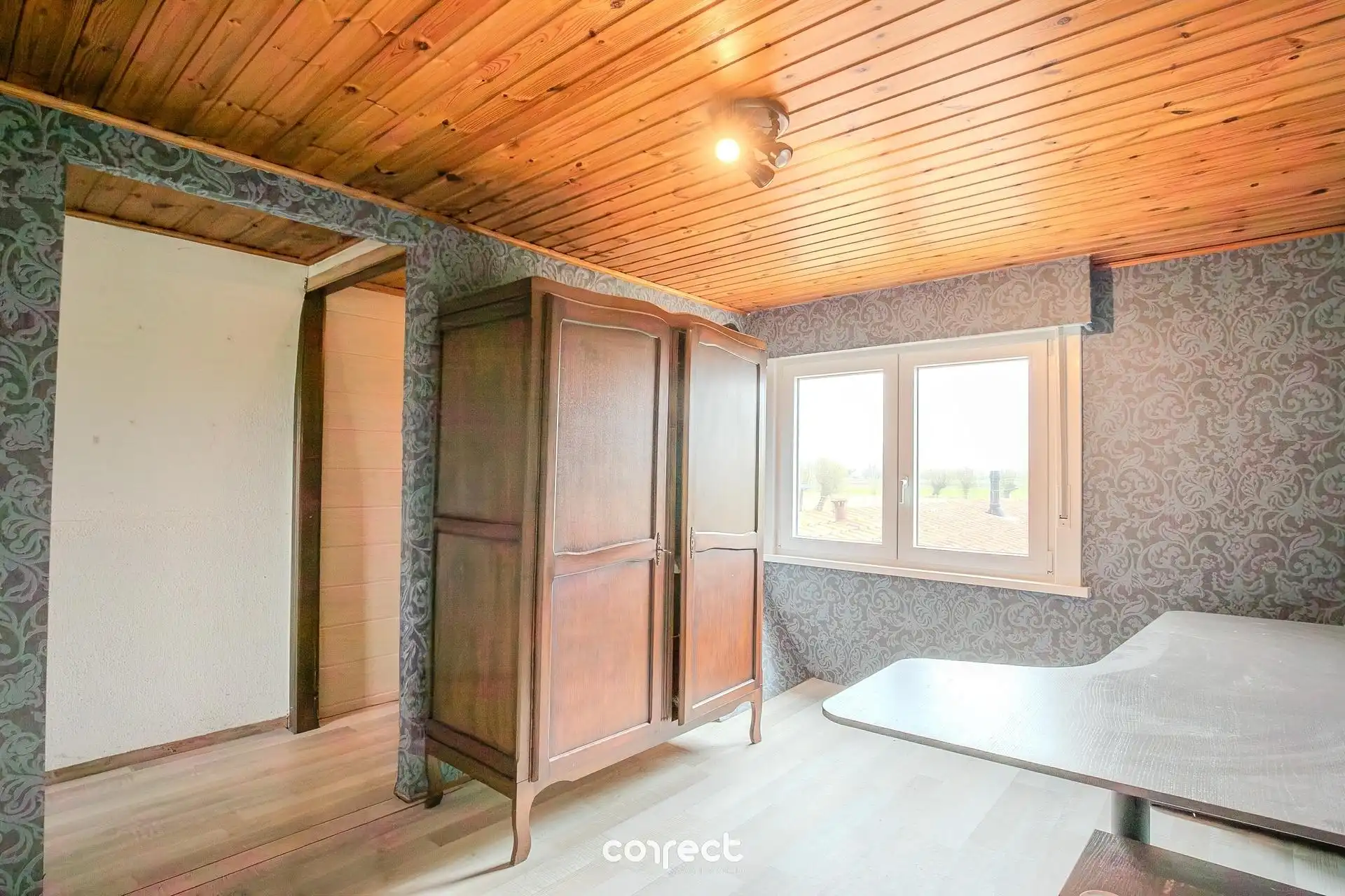 Halfopen bebouwing met garage gelegen op een gunstige ligging en prachtig zicht op de velden. foto 7