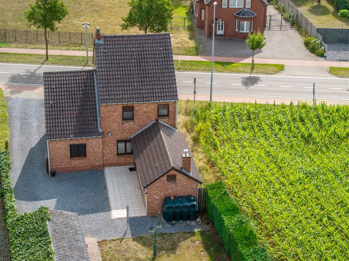 Vrijstaande woning met 3slk op 22a40ca op strategische ligging foto 39