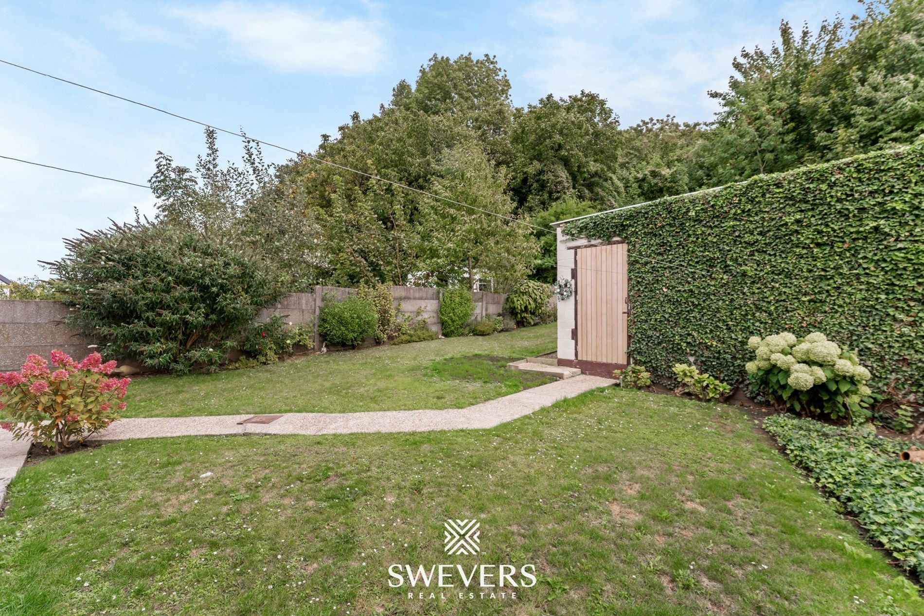 Gelijkvloerse woning met tuin en garage in hartje Tongeren foto 21