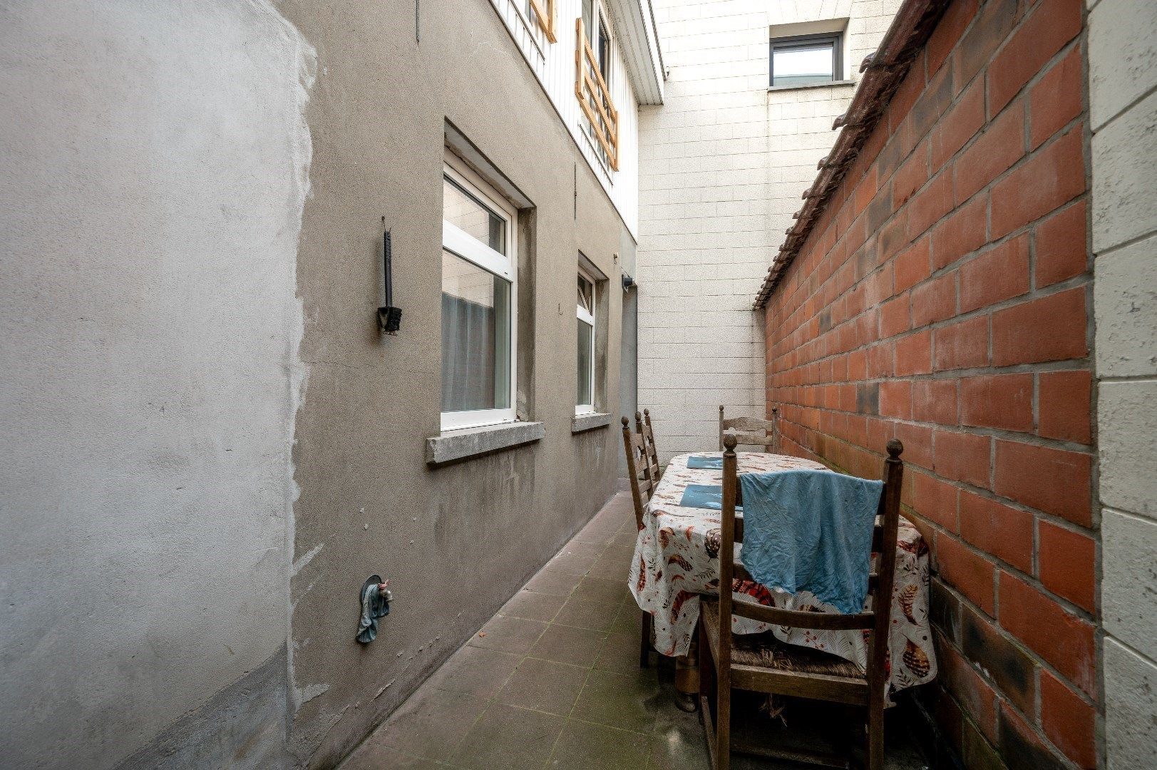 Gelijkvloers woonentiteit (121 m²) met 2 kamers en een koer  foto 16