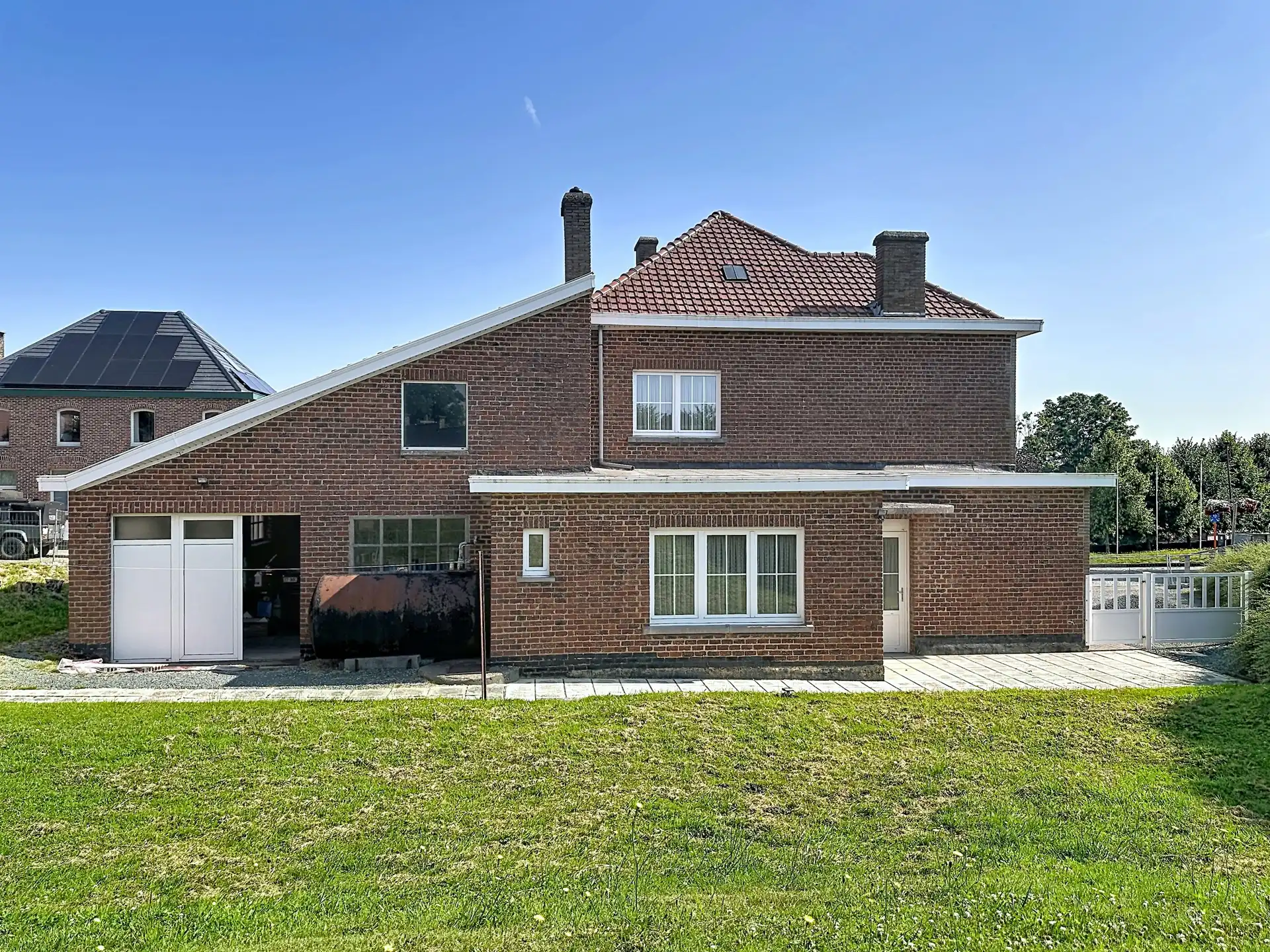 Stevige viergevel met Z-gerichte tuin en werkplaats foto 6