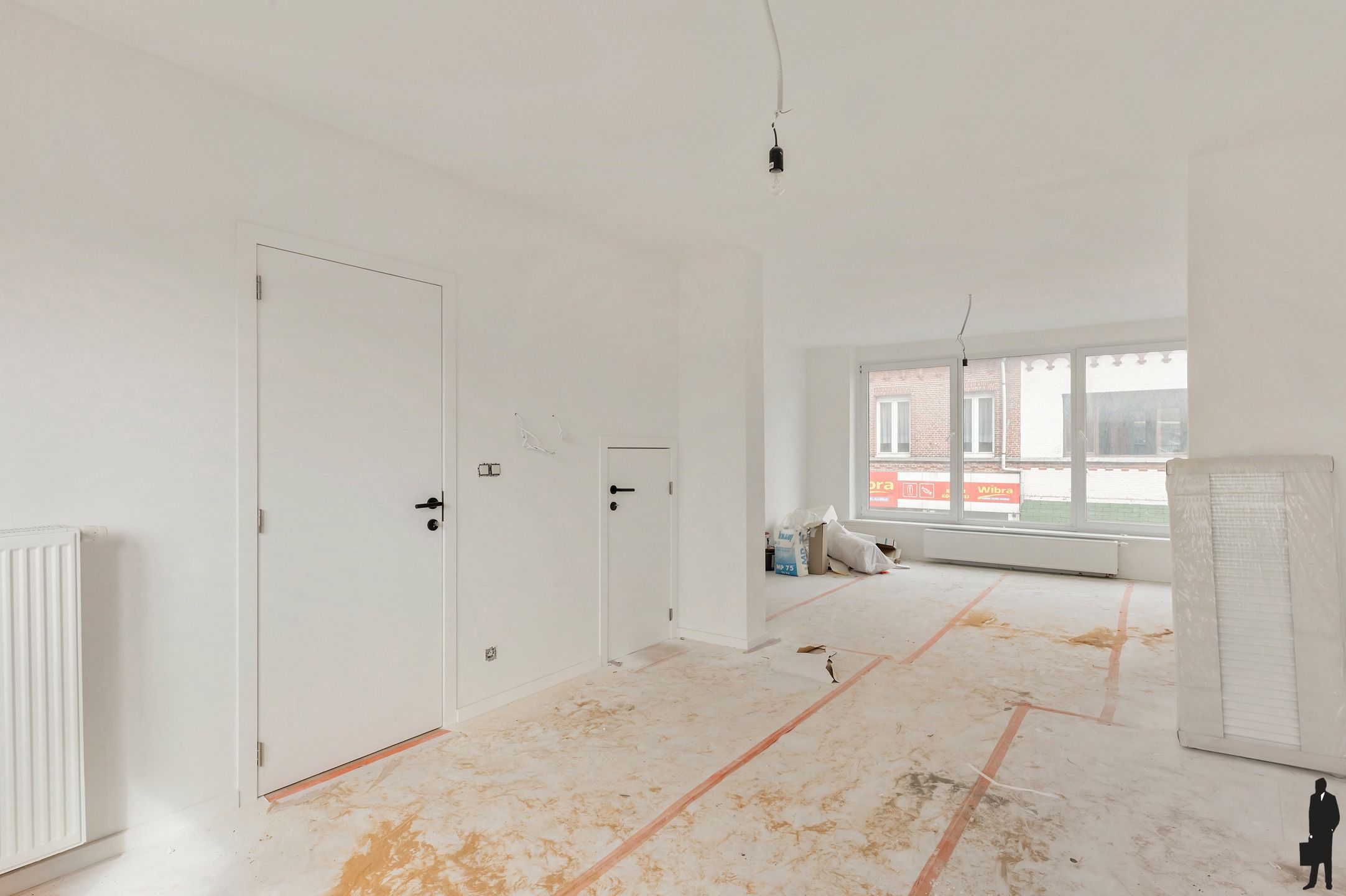 Handelsgelijkvloers met gerenoveerde triplex in het centrum! foto 9