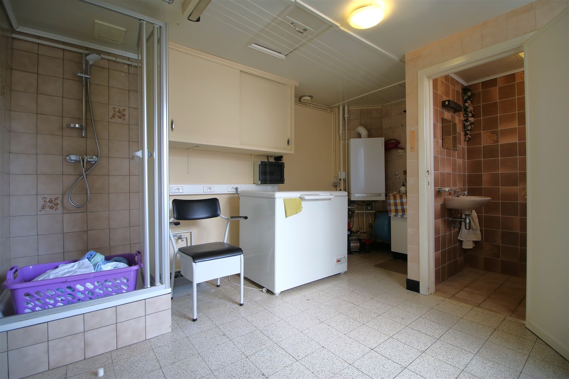 Ruime woning met garage, 4 slpk & tuin foto 7