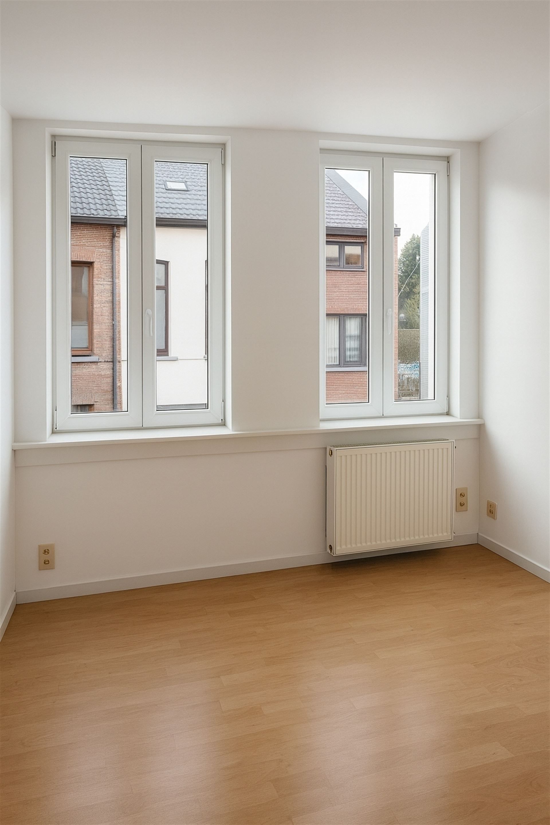 Instapklare stadswoning met 2 slpks en buitenruimte! foto 4