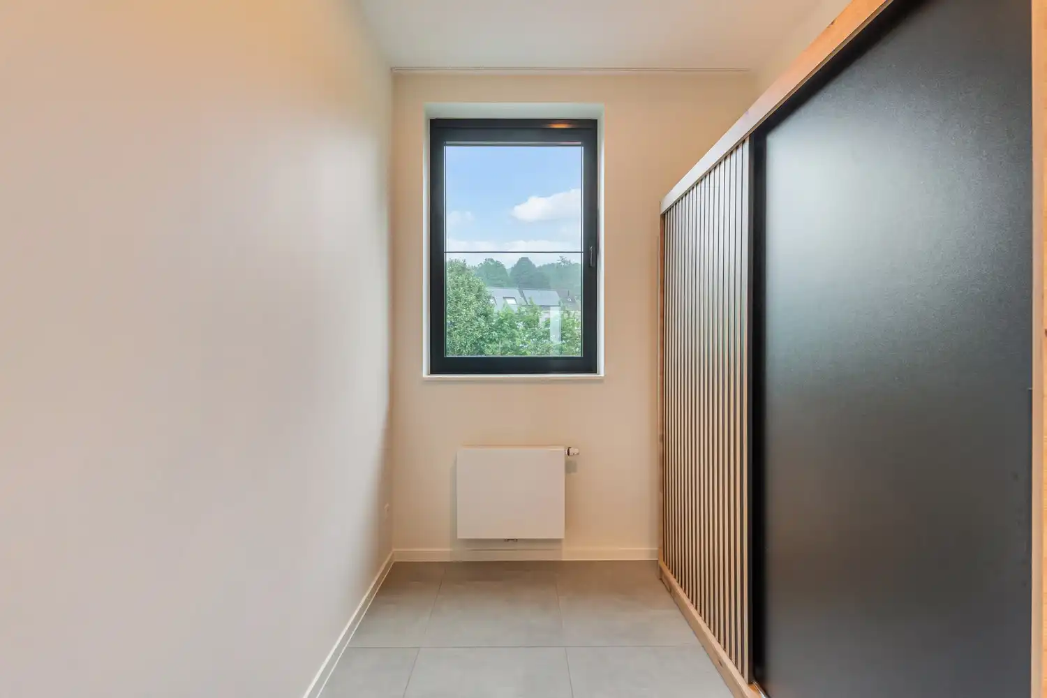 Recent en energiezuinig(A-label) appartement met 2 slaapkamers, 2 autostaanplaatsen, een ruim terras en een private berging te Korbeek-Lo! foto 19
