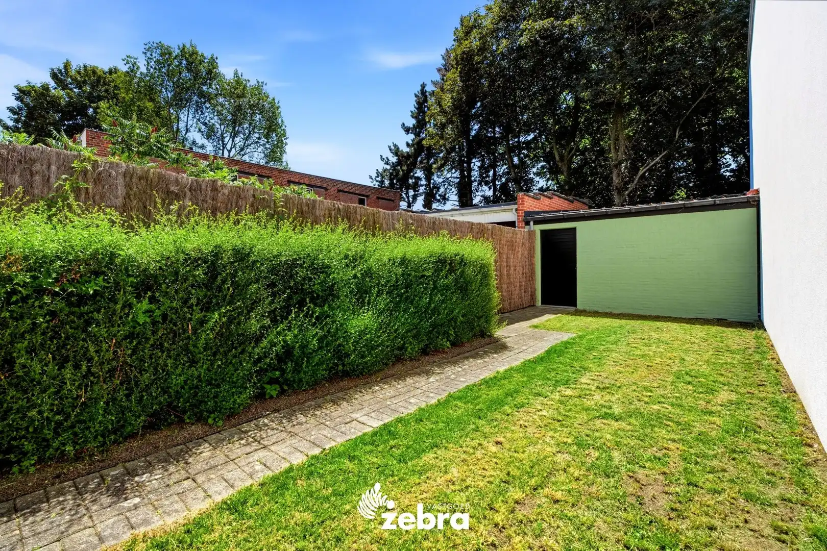 Stijlvolle woning met garage en achterliggende uitweg! foto 22