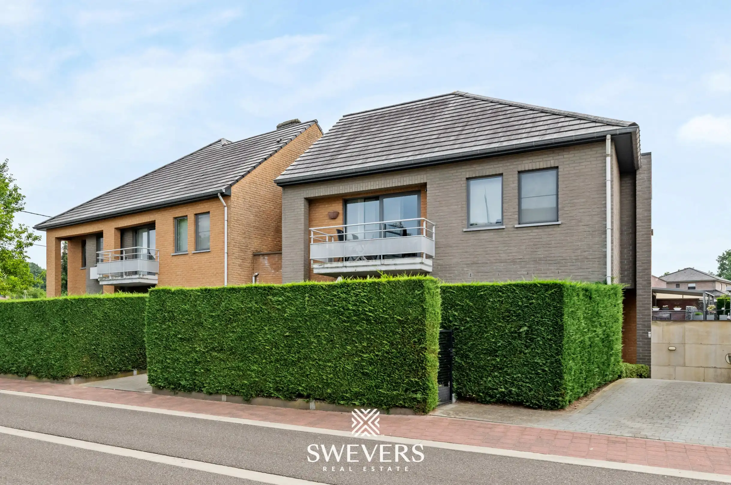 Ruim gelijkvloers appartement met tuin en ondergrondse autostaanplaats foto 24