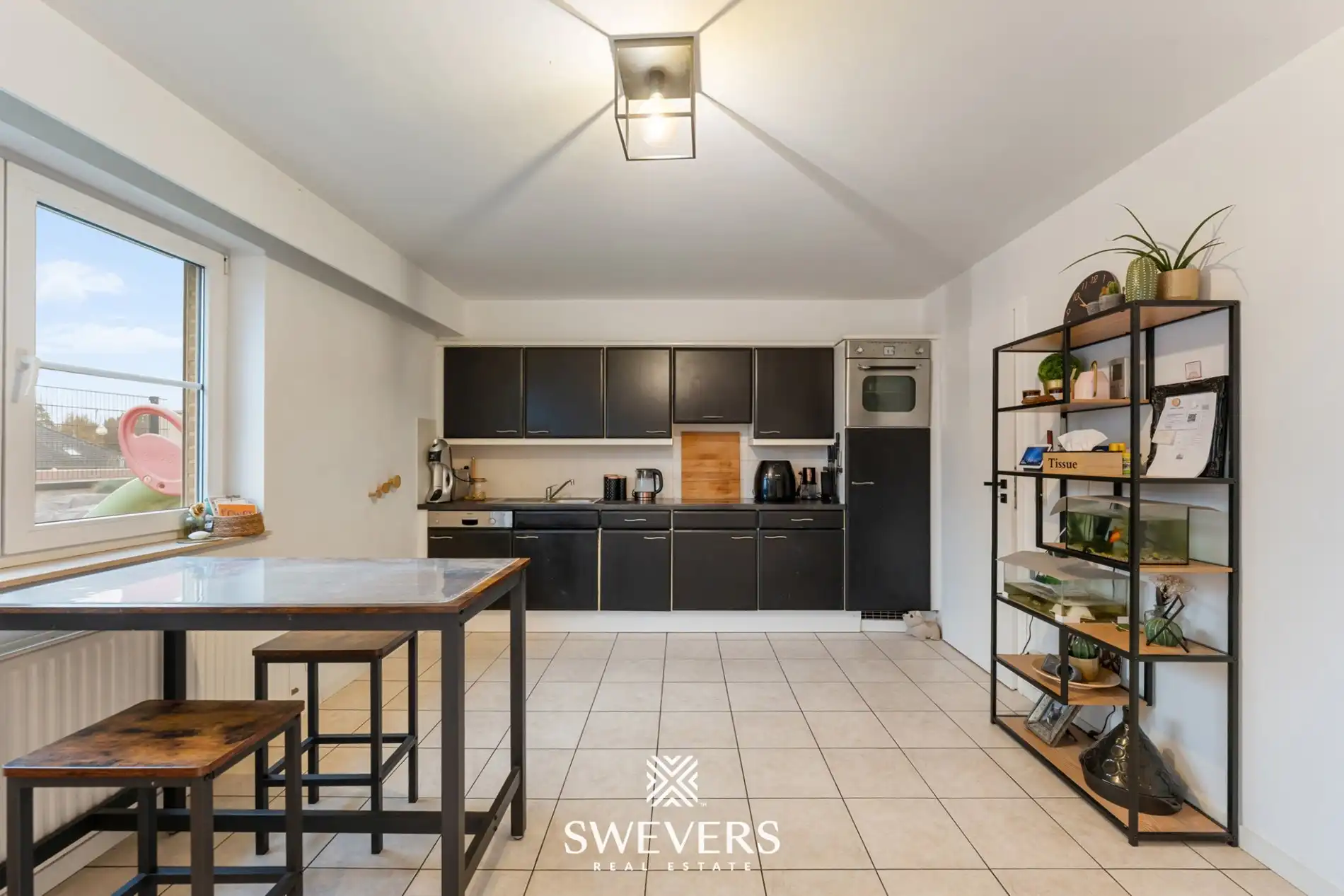 Opbrengsteigendom met handelspand, ruim appartement en uitbreidingspotentieel in hartje Heusden-Zolder foto 22