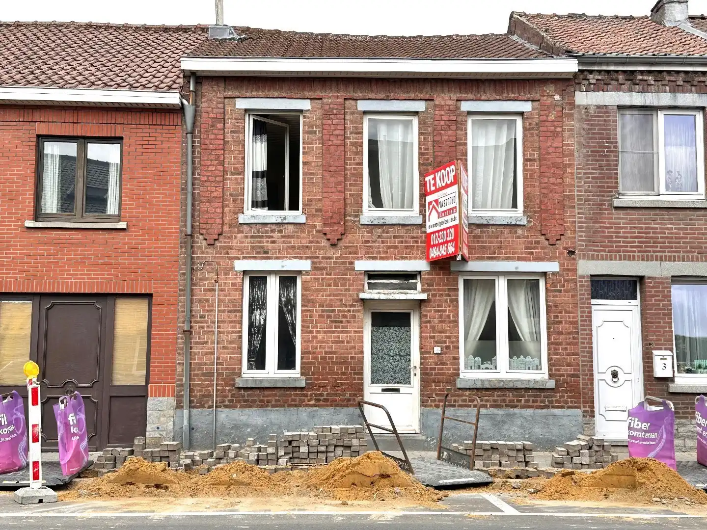 Te renoveren woning met tuin op toplocatie in Tongeren. foto {{pictureIndex}}