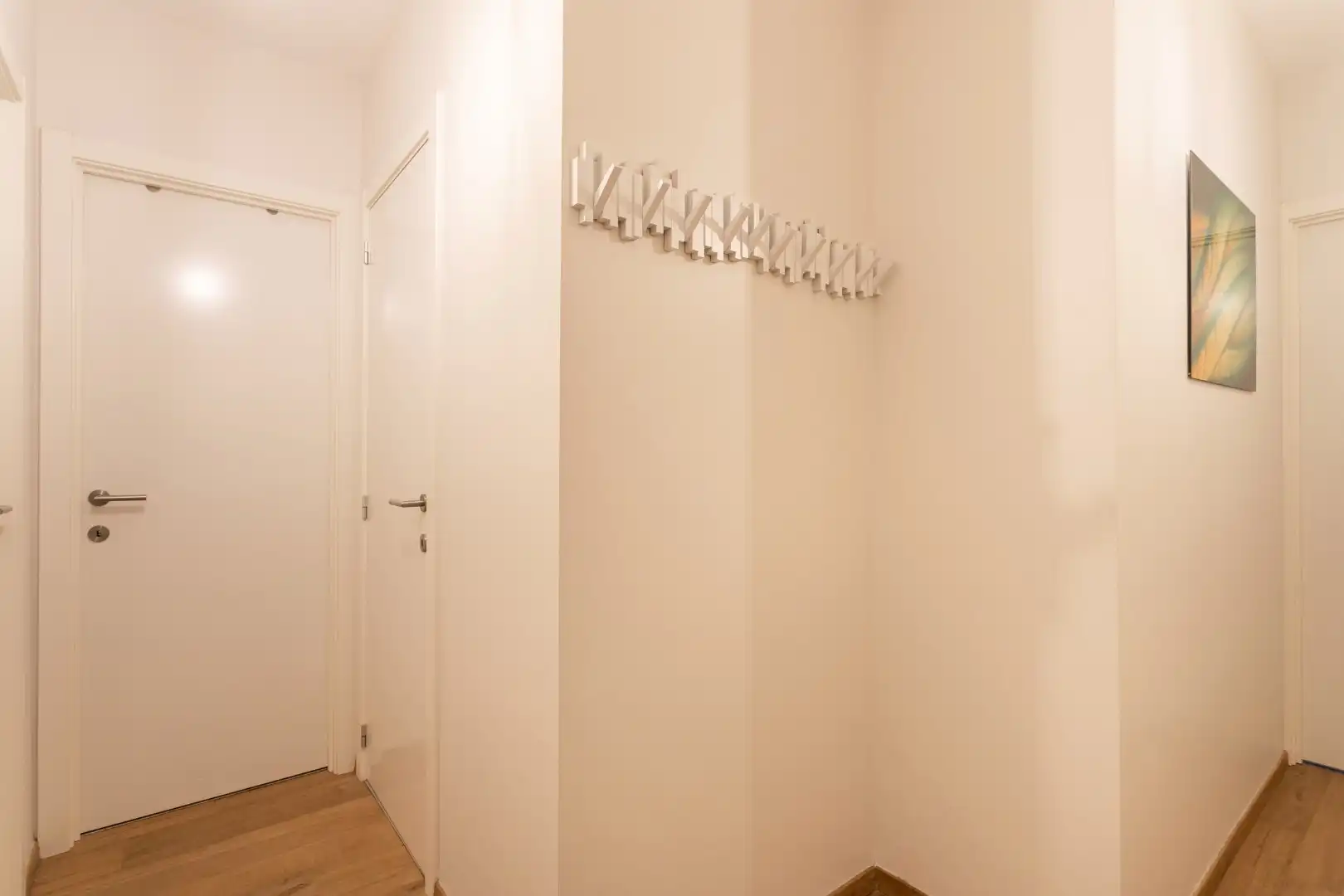 Instapklaar en energiezuinig gelijkvloers appartement met 2 SLPKS, tuin en terras foto 7