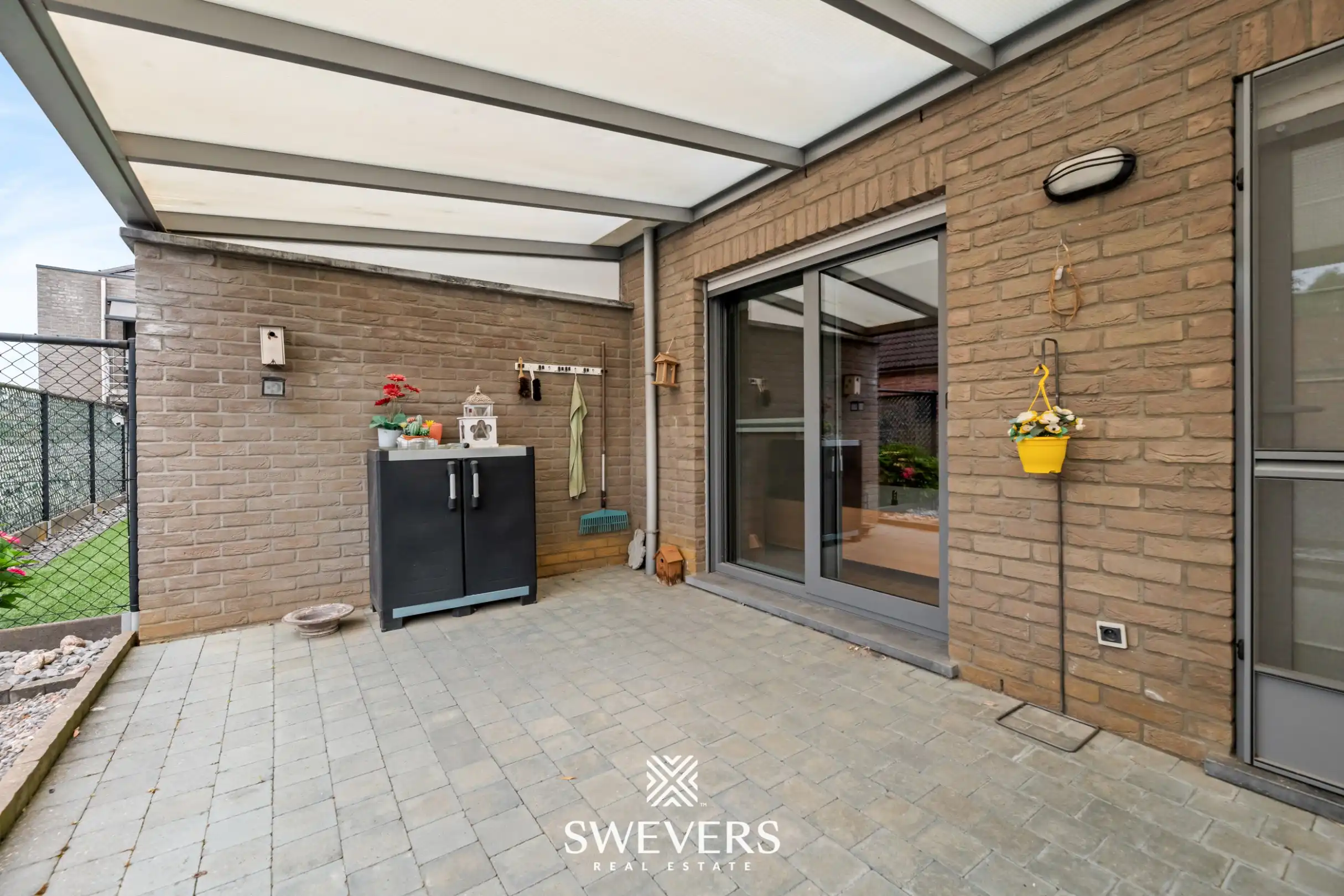 Ruim gelijkvloers appartement met tuin en ondergrondse autostaanplaats foto 25