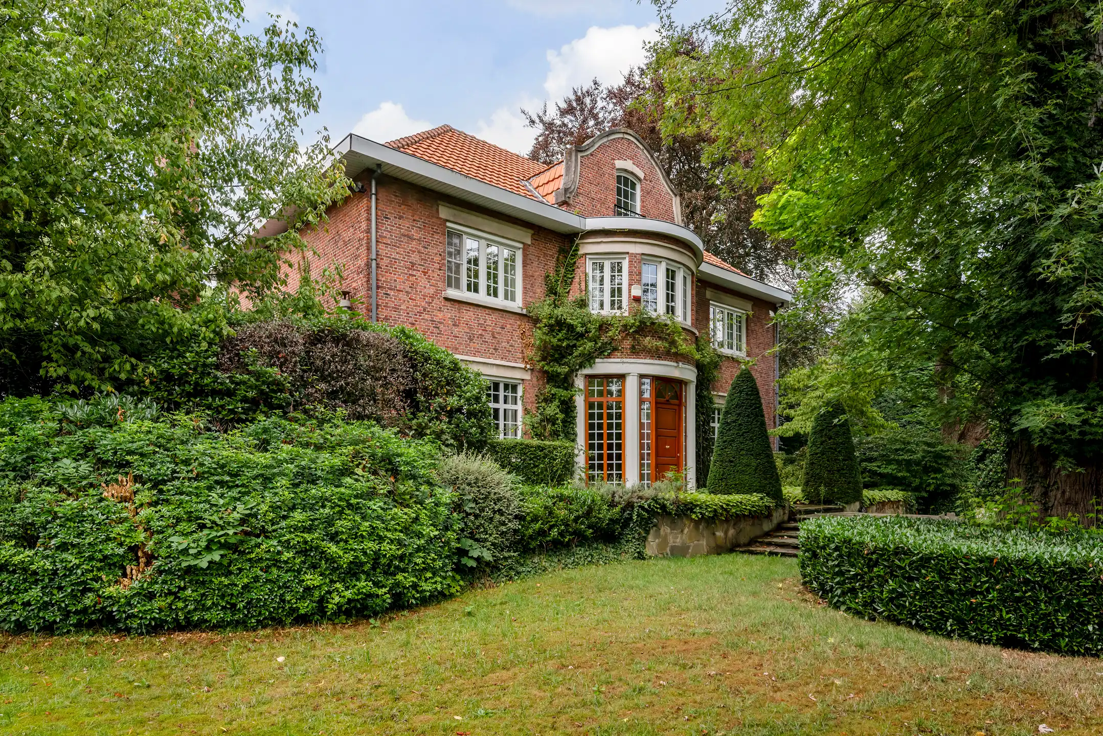 Charmante villa met parktuin op 4.309 m² in Brasschaat foto {{pictureIndex}}