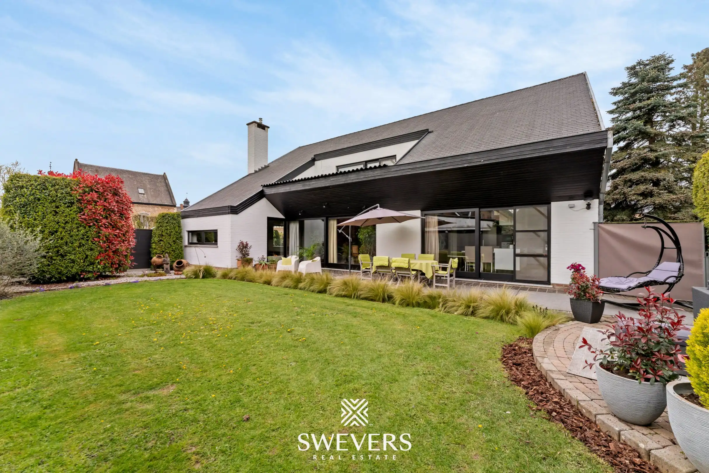 Authentieke villa met praktijkruimte en grote tuin te Hoepertingen foto 2