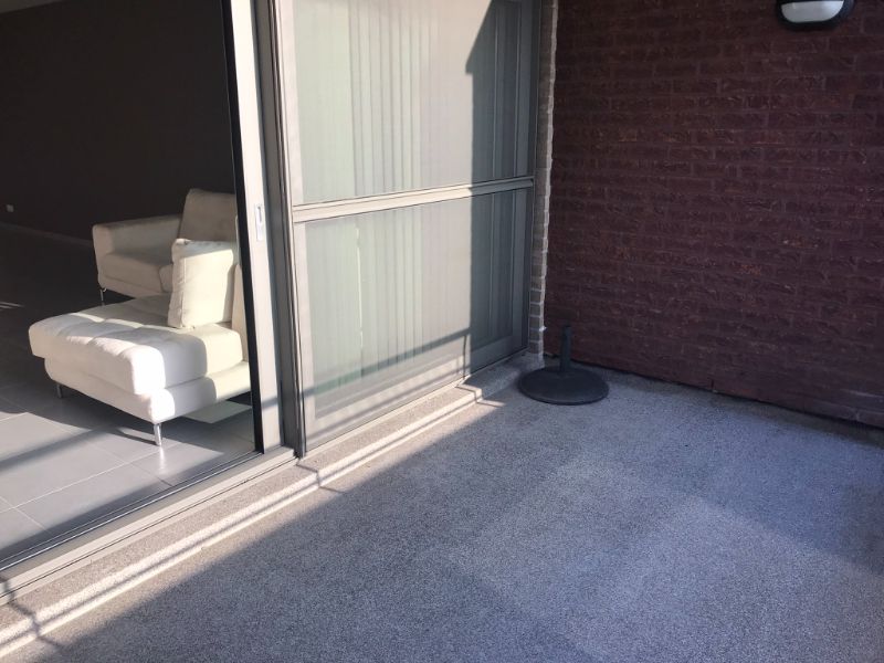 Rustig en zon georiënteerd, instapklaar 2 slk appartement met terras, private garage en dichtbij het Station van Denderleeuw en winkels foto 15