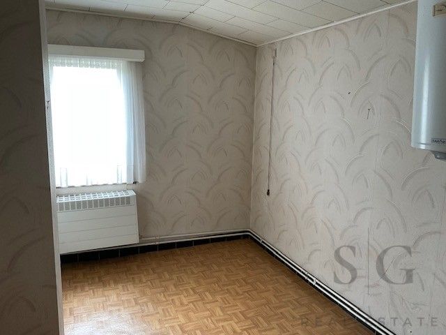 Te renoveren vrijstaande woning op ruim perceel tussen Bocholt en Bree – rust en potentieel op meer dan 32 are foto 12