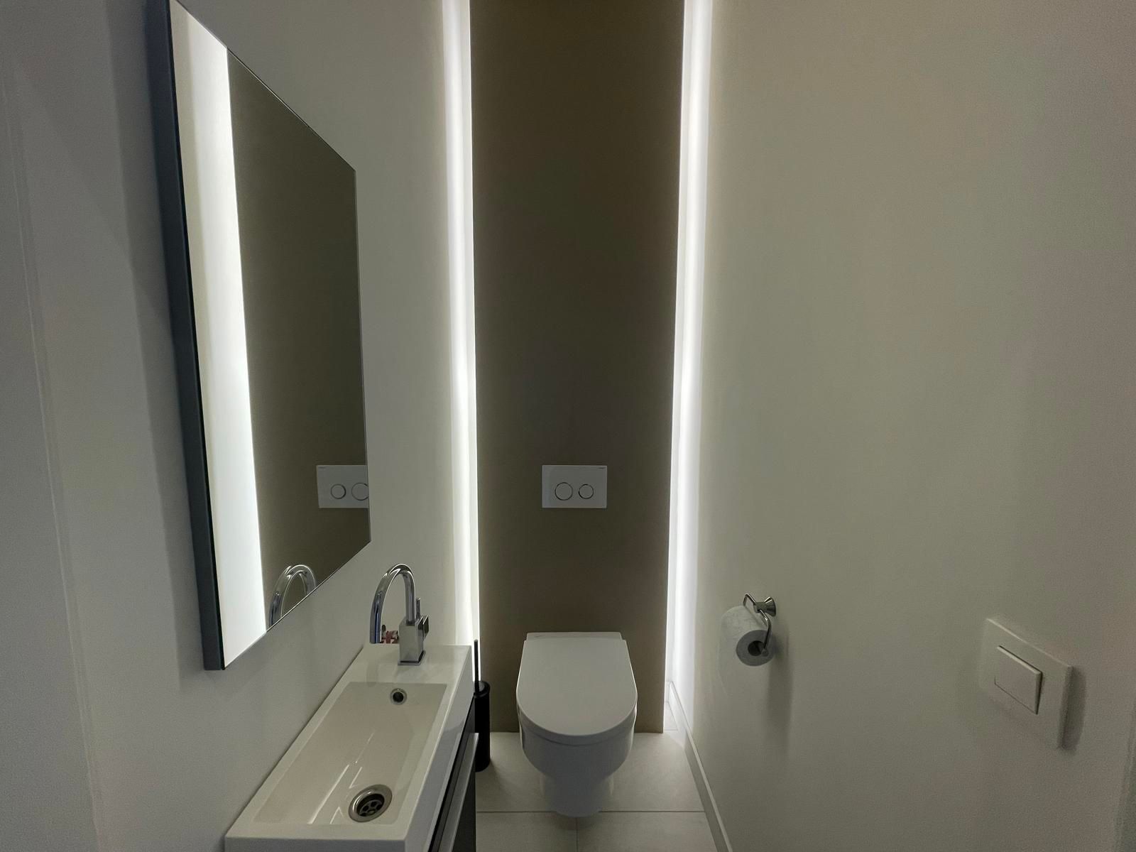 OORDEGEM - Gerenoveerde rijwoning met tuin. foto 11