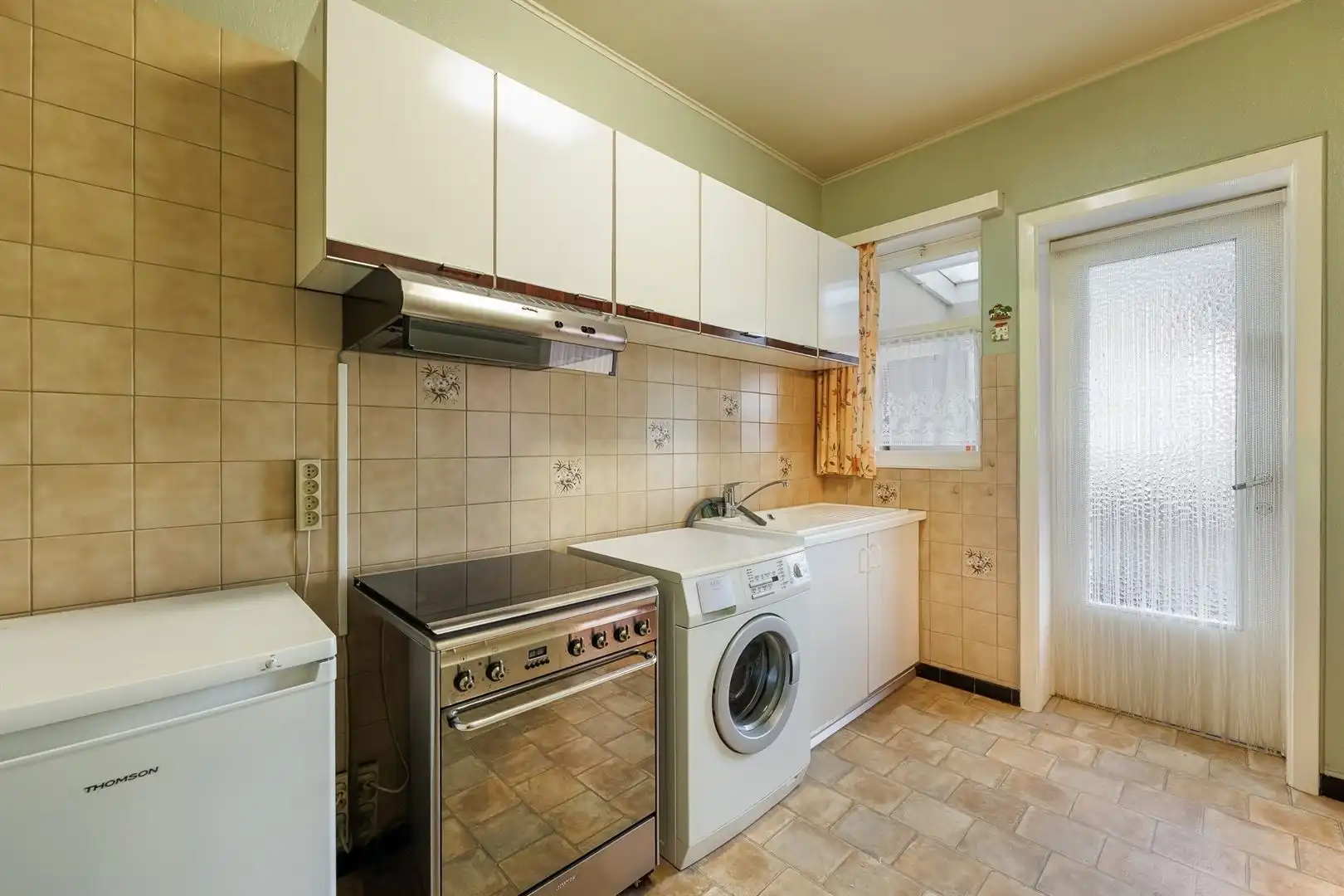 Ruime woning, perfect onderhouden met een zonnige tuin. foto 16