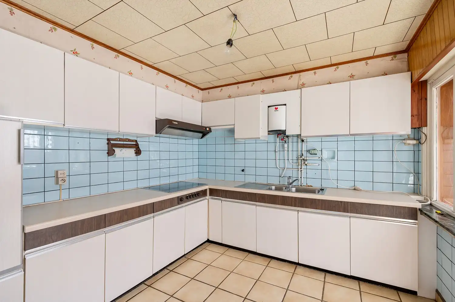 Te renoveren woning met garage en diepe tuin. foto 11