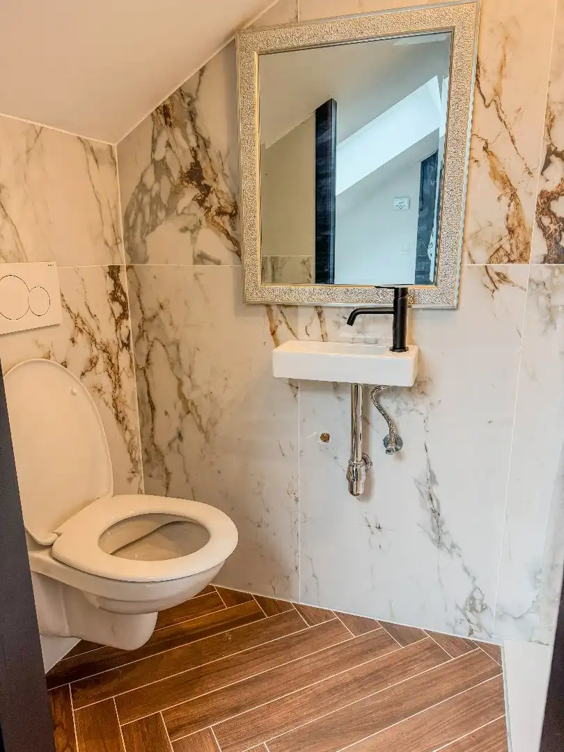 Gerenoveerde & bemeubelde studio te huur in centrum Leuven foto 13