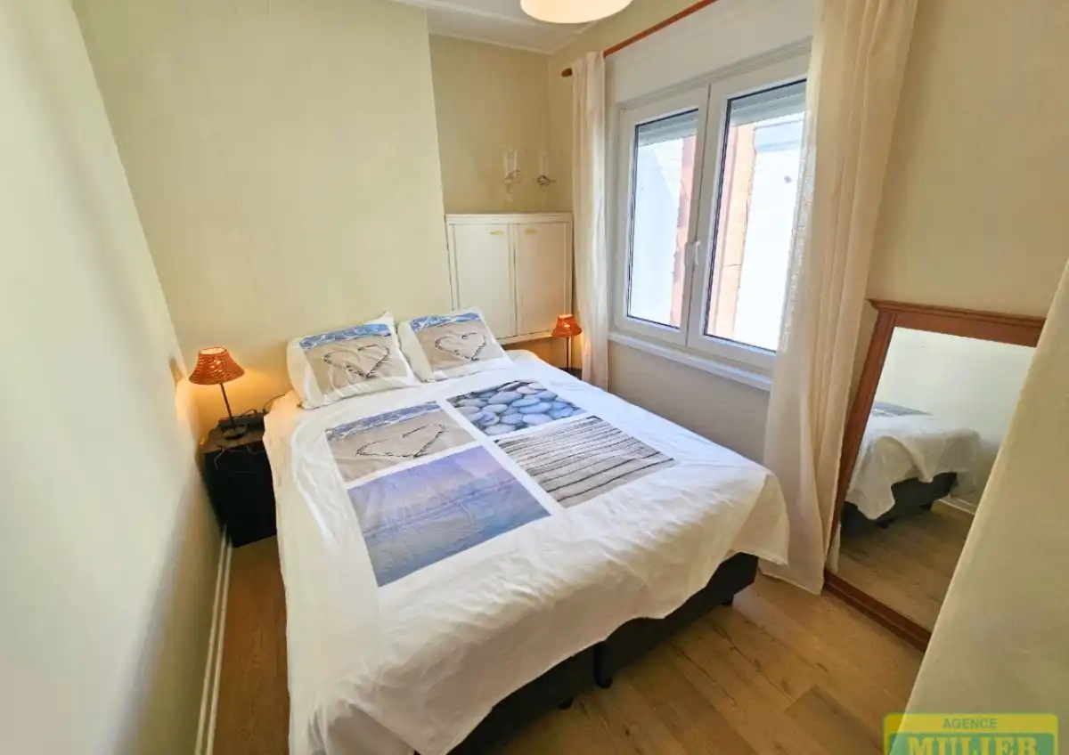 GERENOVEERD APPARTEMENT MET ZIJDELINGS ZEEZICHT TE KOOP IN DE PANNE foto 9