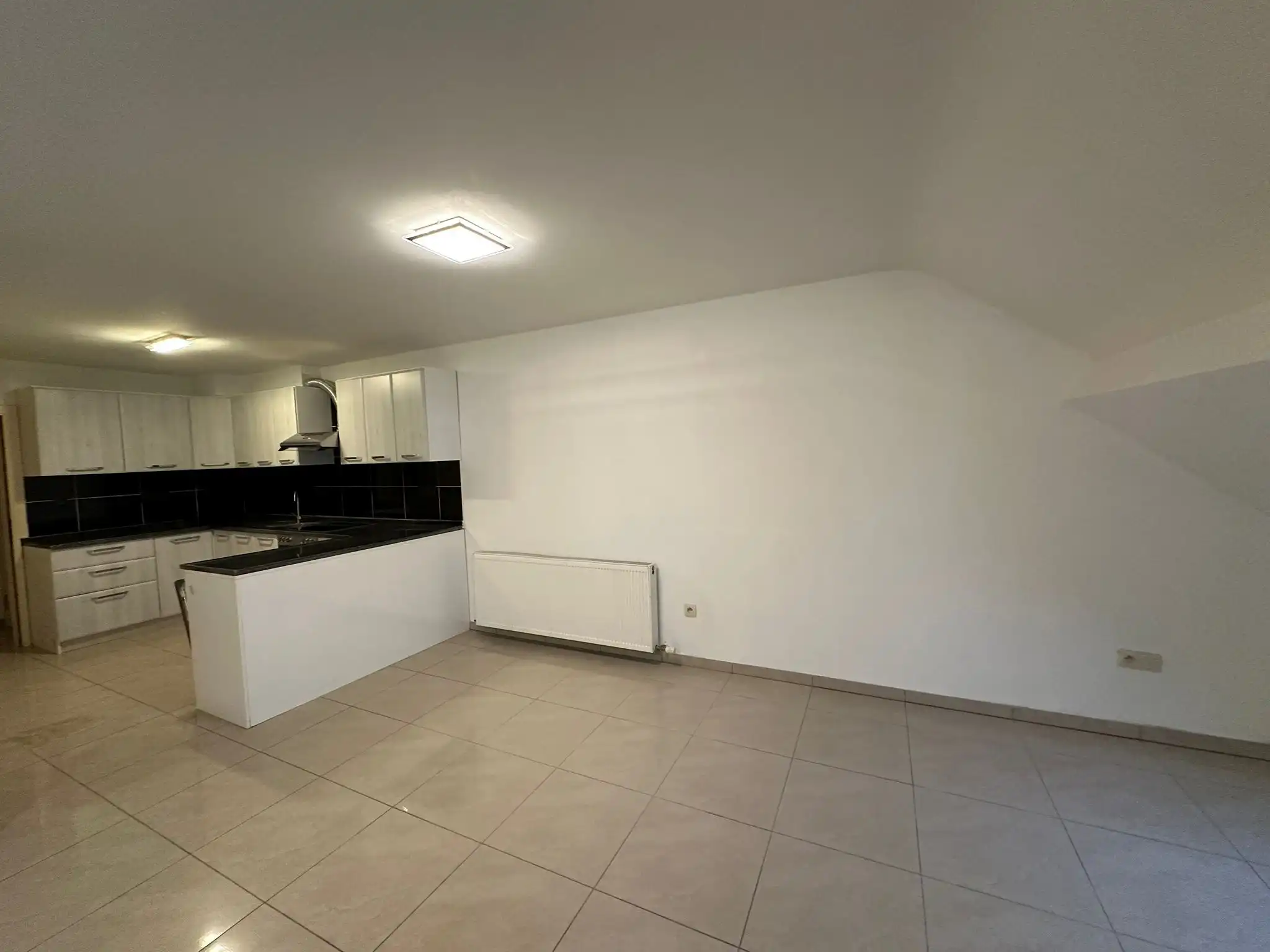 Dakappartement met 2 ruime slaapkamers te Eisden centrum foto 6