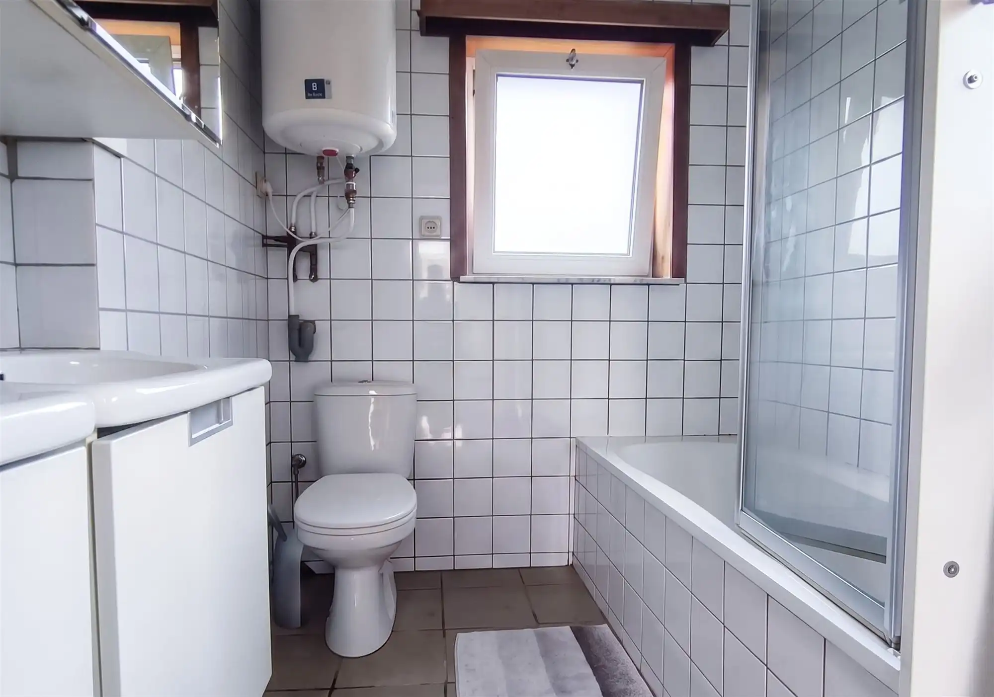 Landelijk woonhuis met 2 slaapkamers, grote tuin en carport/berging foto 10