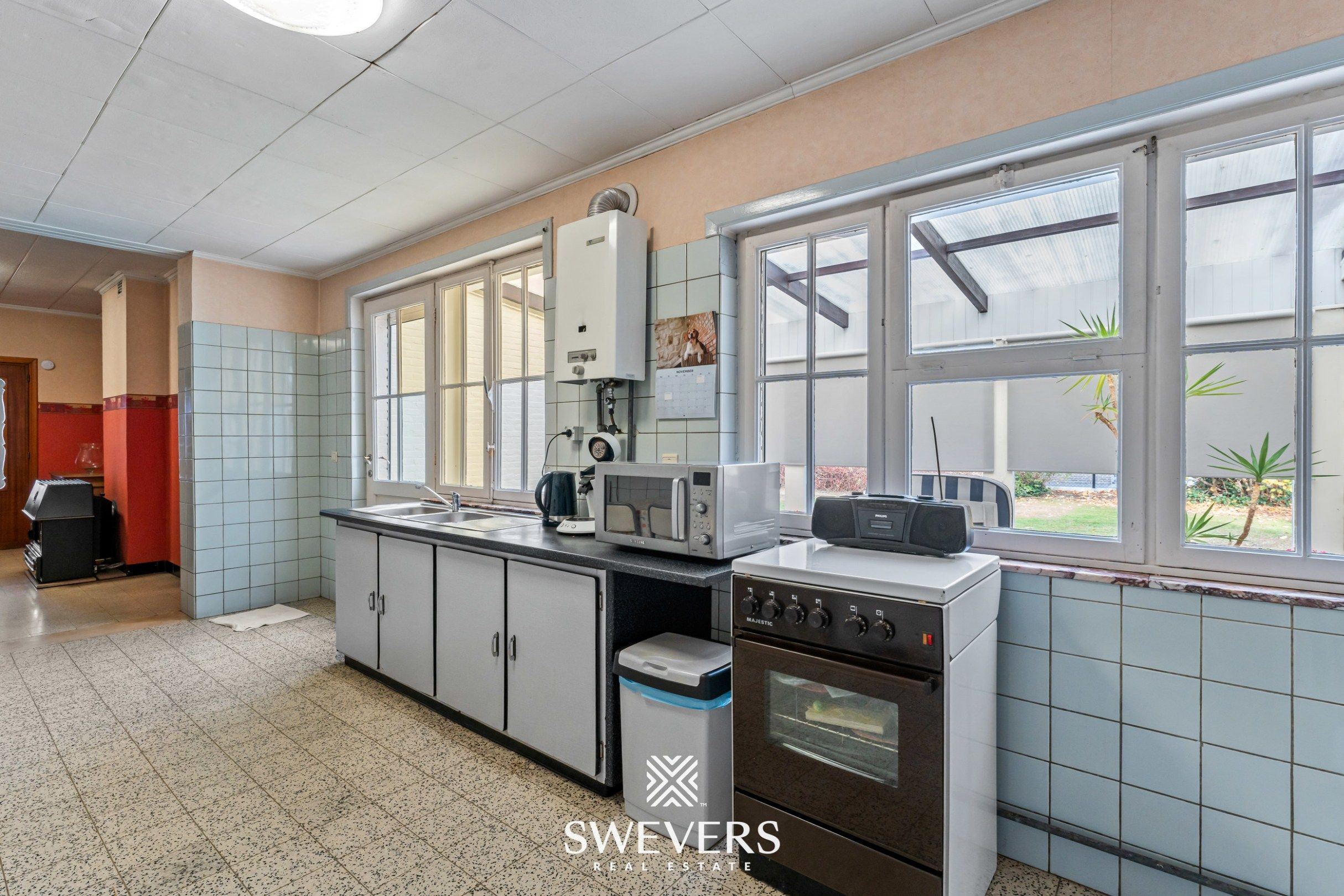 Charmante halfopen gezinswoning met potentieel (8are) op toplocatie in Diepenbeek foto 15