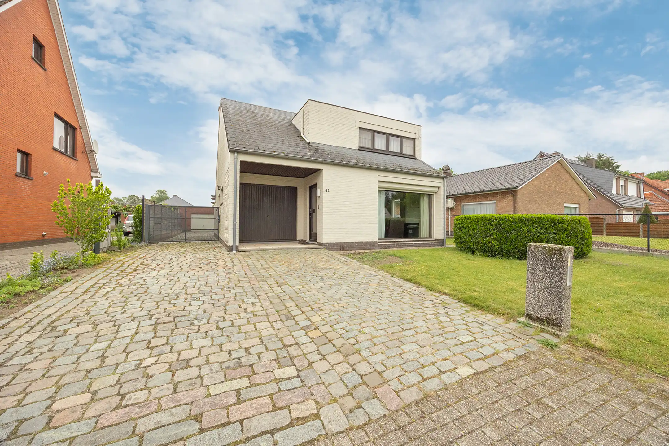Open bebouwing met tuin en garage foto 30