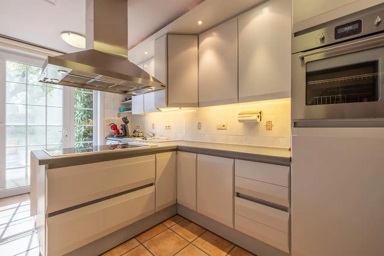 Karaktervolle en instapklare woning met zonnige tuin nabij het Gras- en Crauwelsbos foto 12