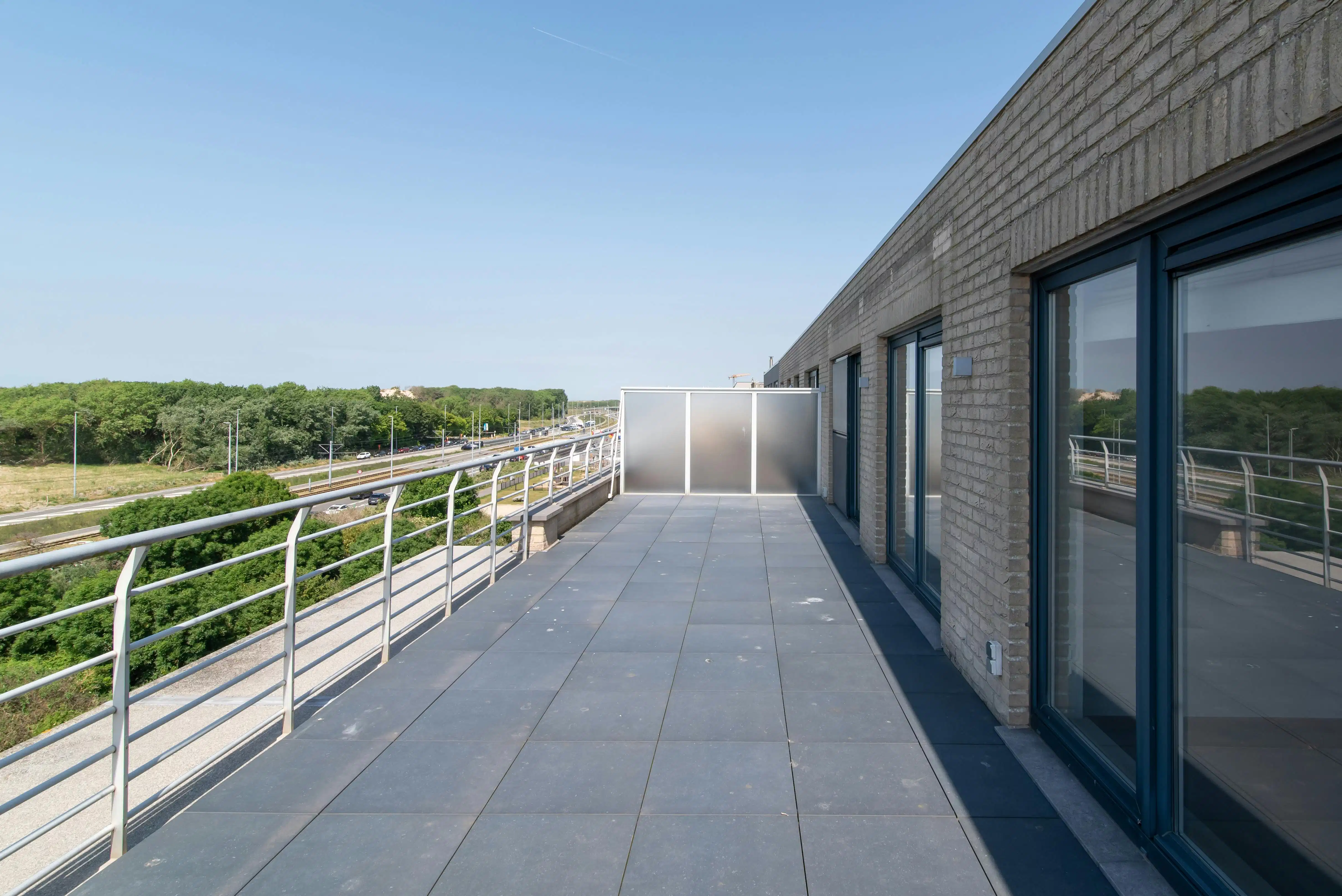 Exclusief penthouse te Bredene met duinen- en zeezicht foto 26