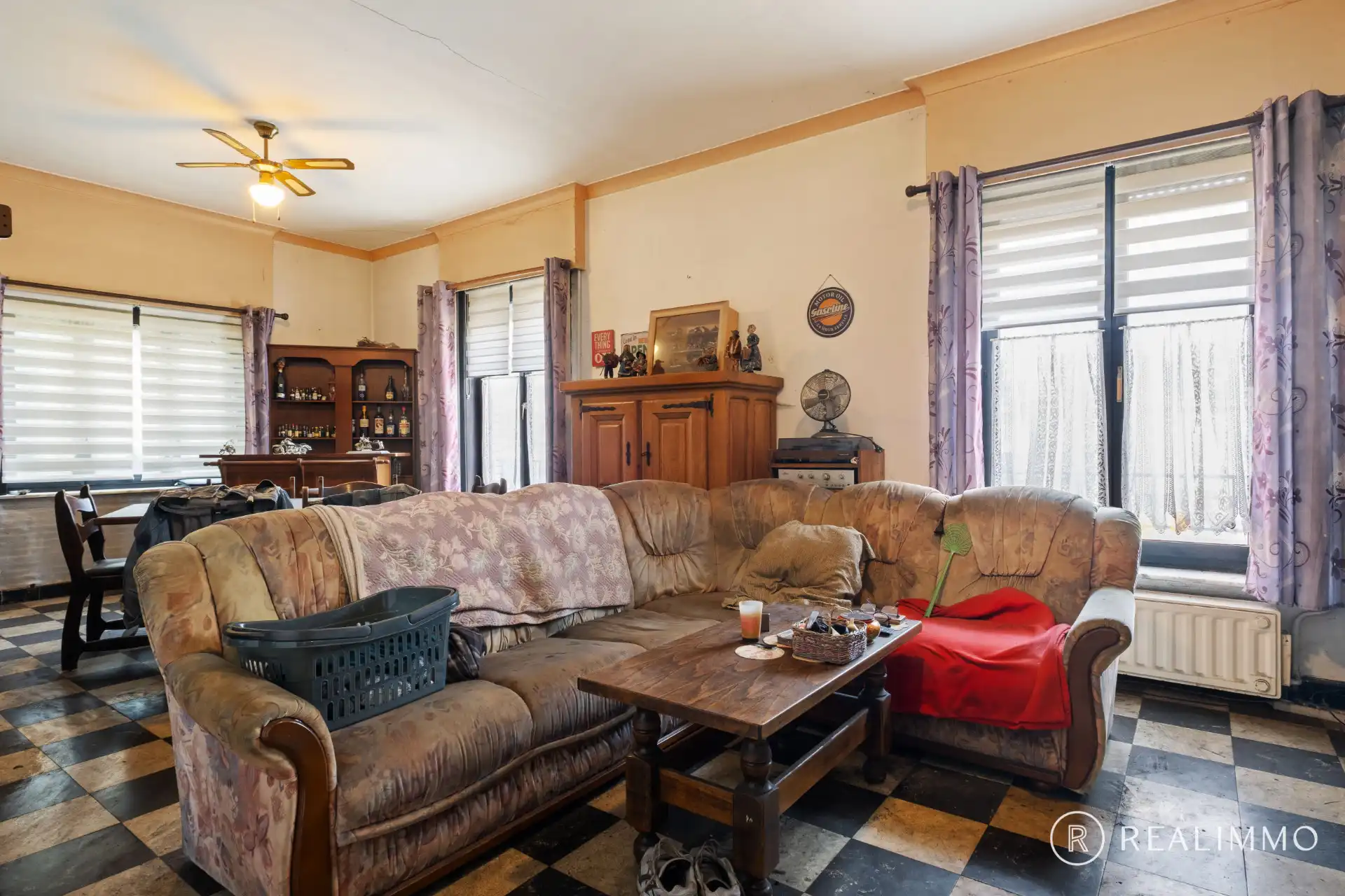 Alleenstaande woning met renovatiepotentieel in het centrum van Helkijn foto 4