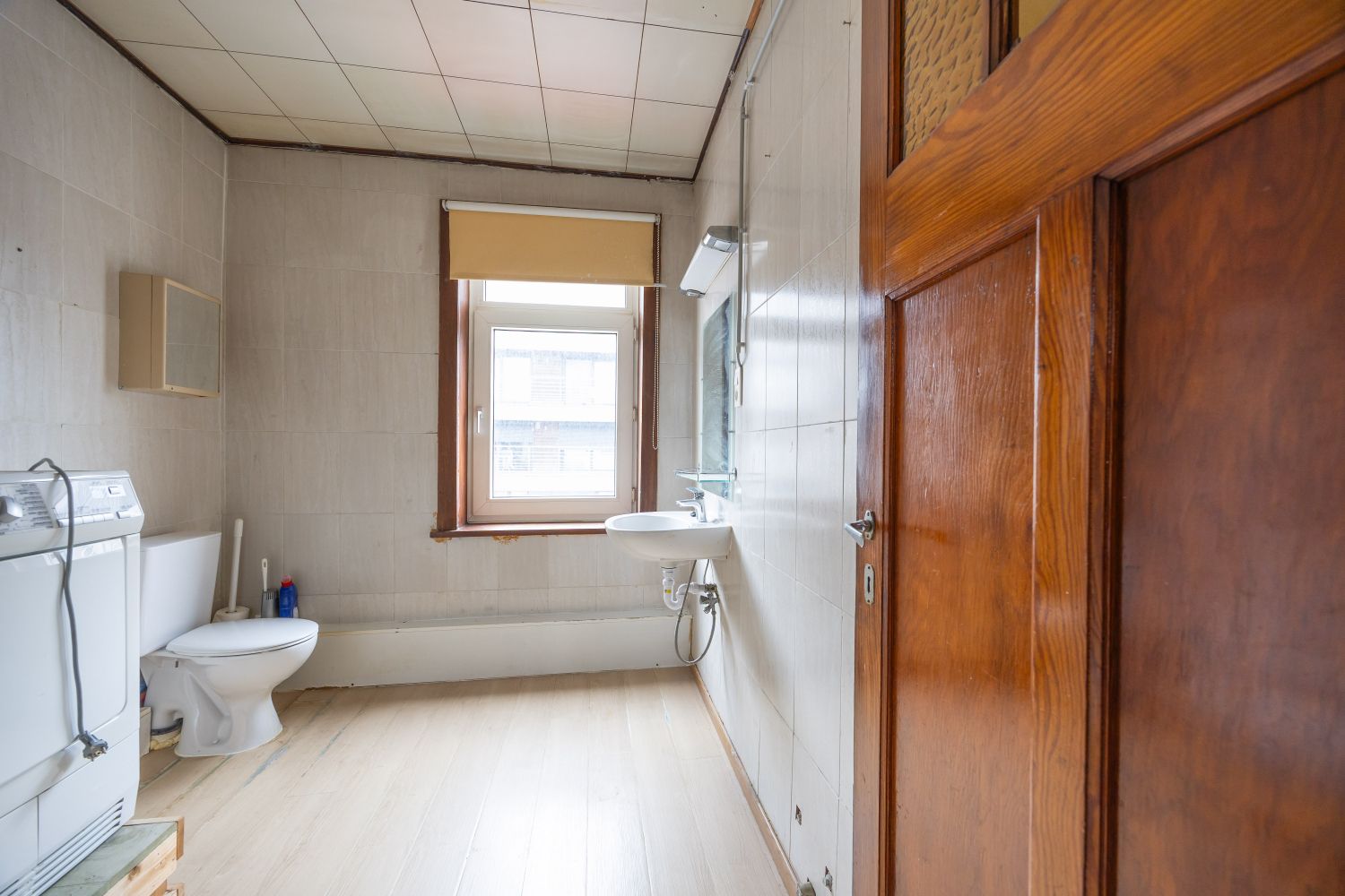Ruime te renoveren woning met zonnige tuin en tal van mogelijkheden. foto 45