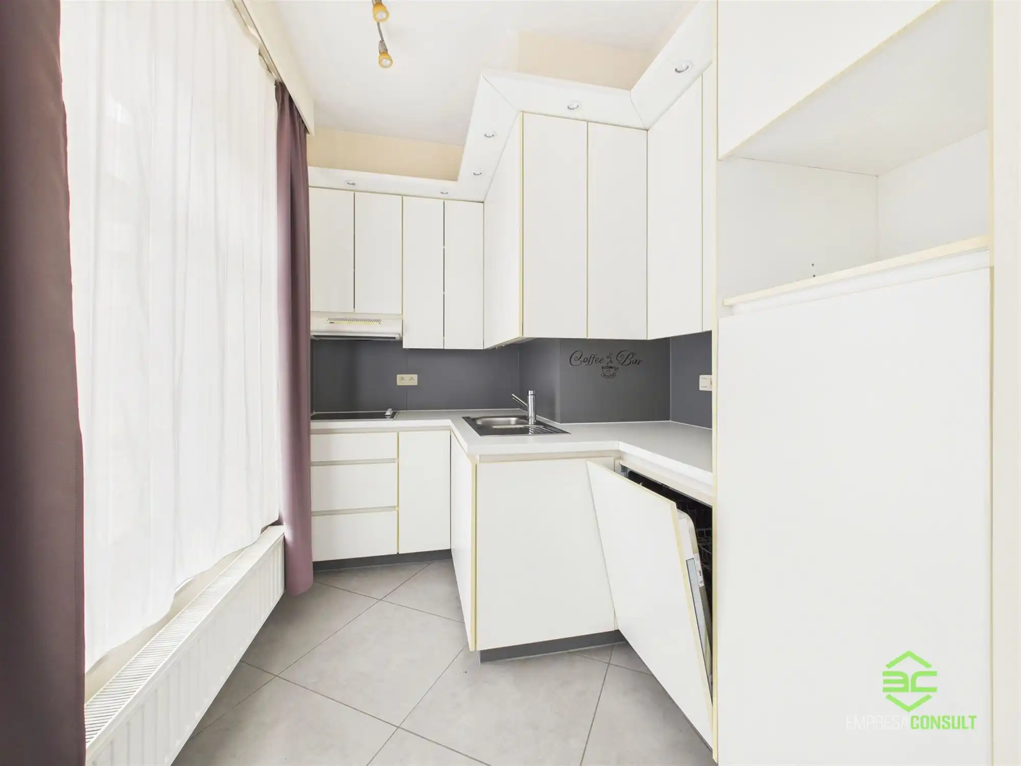 Interessant opbrengsteigendom met 4 app in het centrum! foto 7